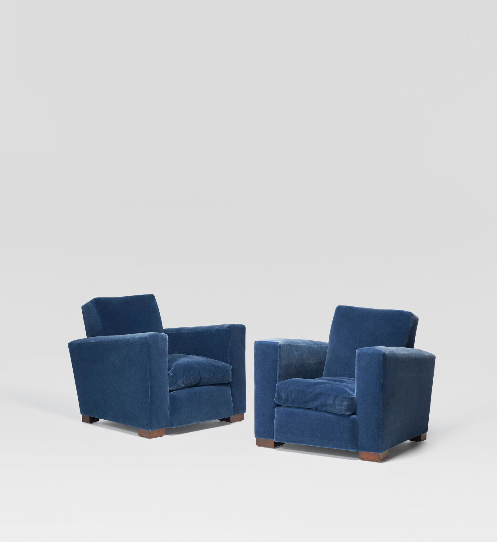 JACQUES ADNET (1900-1984) Pair of Club Chairs, circa 1940: JACQUES ADNET (1900-1984) Pair of Club Chairs, circa 1940 Details stained beech, velvet upholstery 301⁄2 x 32 x 32 in. (77.5 x 81.2 x 81.2 cm) (each) Provenance Calderwood Gallery, Philadelphia