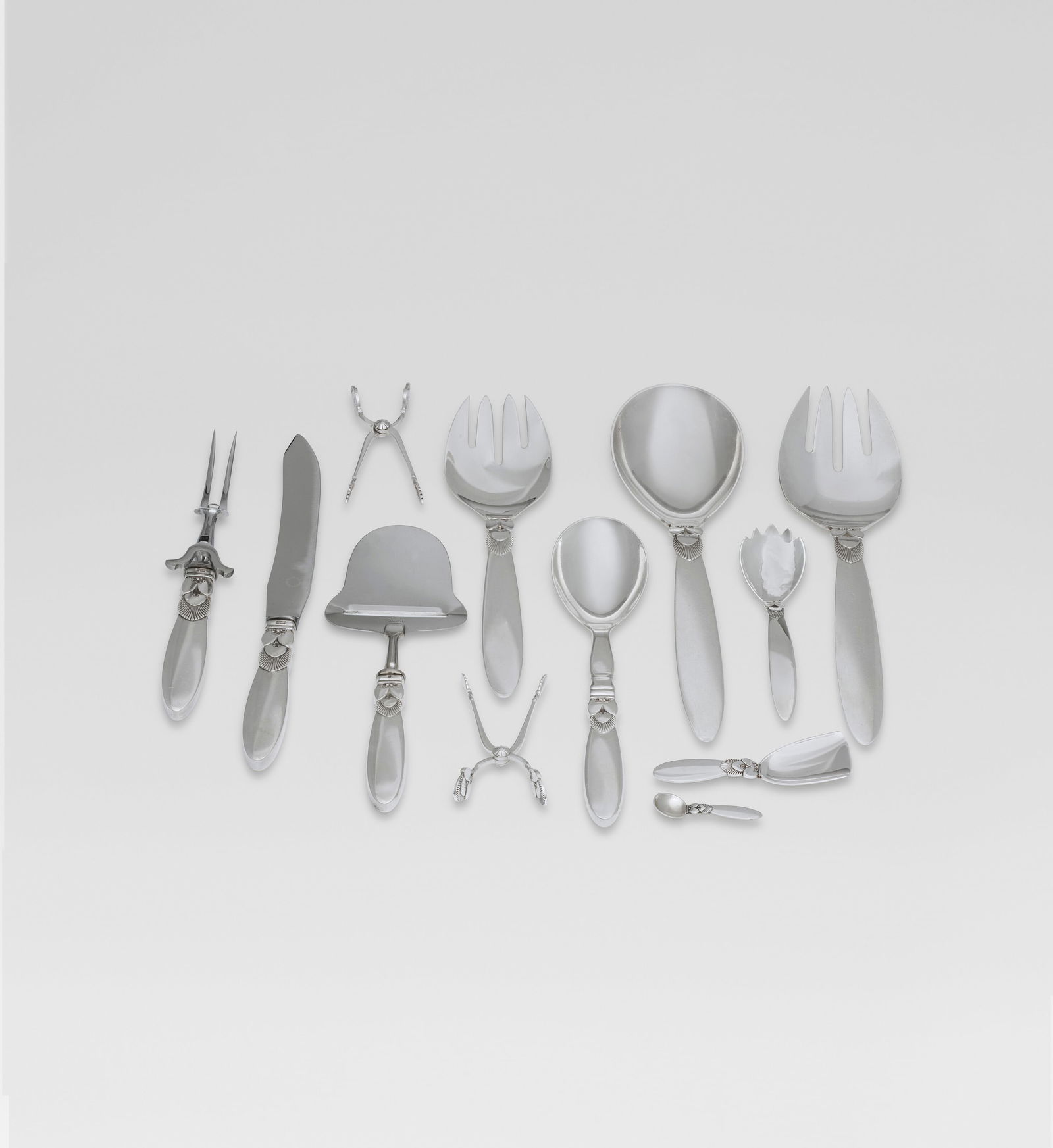 GUNDORF ALBERTUS (1884-1969) 'Cactus' Flatware Service, designed 1930: GUNDORF ALBERTUS (1884-1969) 'Cactus' Flatware Service, designed 1930 Details manufactured by Georg Jensen, Copenhagen, Denmark silver comprising: six dinner spoons twenty-four teaspoons two soup spoo