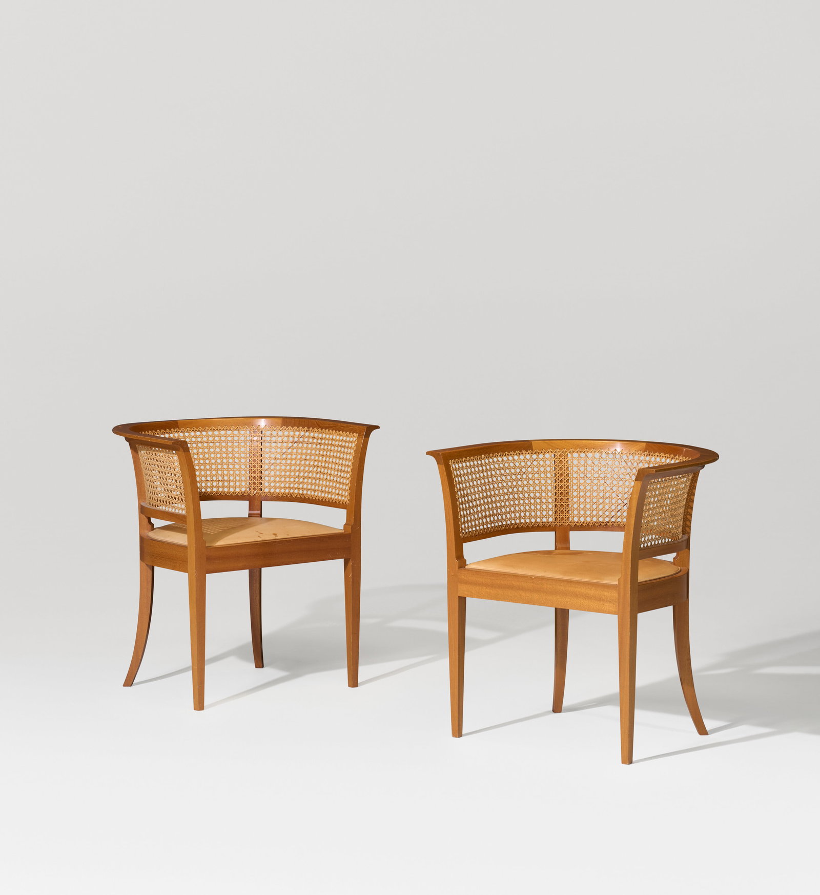 KAARE KLINT (1888-1954) Pair of 'Faaborg' Armchairs, Model No. 4395, designed for the Faaborg: KAARE KLINT (1888-1954) Pair of 'Faaborg' Armchairs, Model No. 4395, designed for the Faaborg Museum, Denmark, 1914, executed circa 1970 Details manufactured by Rud. Rasmussen Cabinetmakers, Copenhage