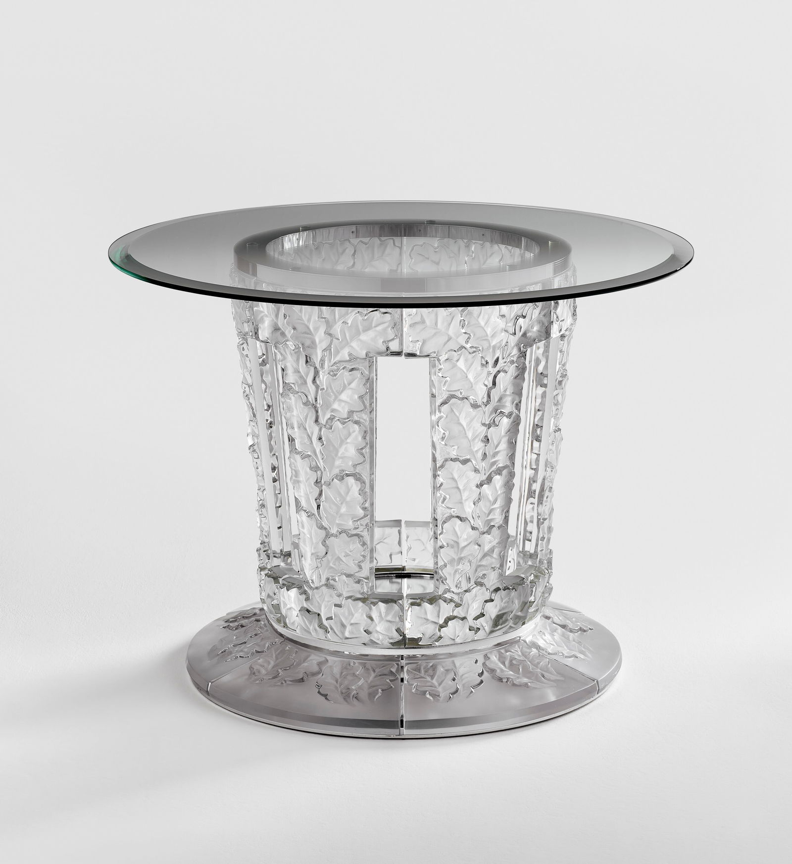 MARC LALIQUE (1900-1977) 'Chêne' Table, Model No. 10.301, designed 1951, executed 1995: MARC LALIQUE (1900-1977) 'Chêne' Table, Model No. 10.301, designed 1951, executed 1995 Details molded and frosted glass, mirrored glass, chrome-plated metal 301⁄4 in. (76.8 cm) high, 42 in.