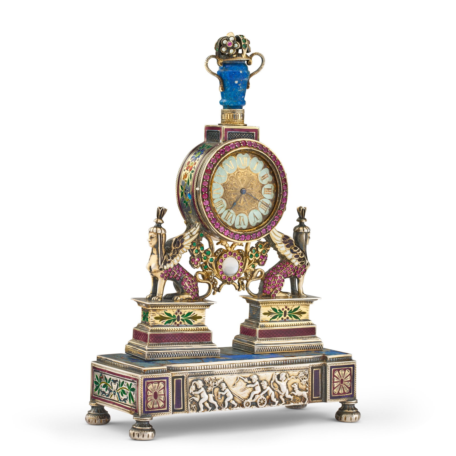 AN AUSTRIAN GEM-SET AND ENAMELED SILVER AND LAPIS LAZULI FIGURAL CLOCK PROBABLY VIENNA, LAST QUARTER (1 of 3)