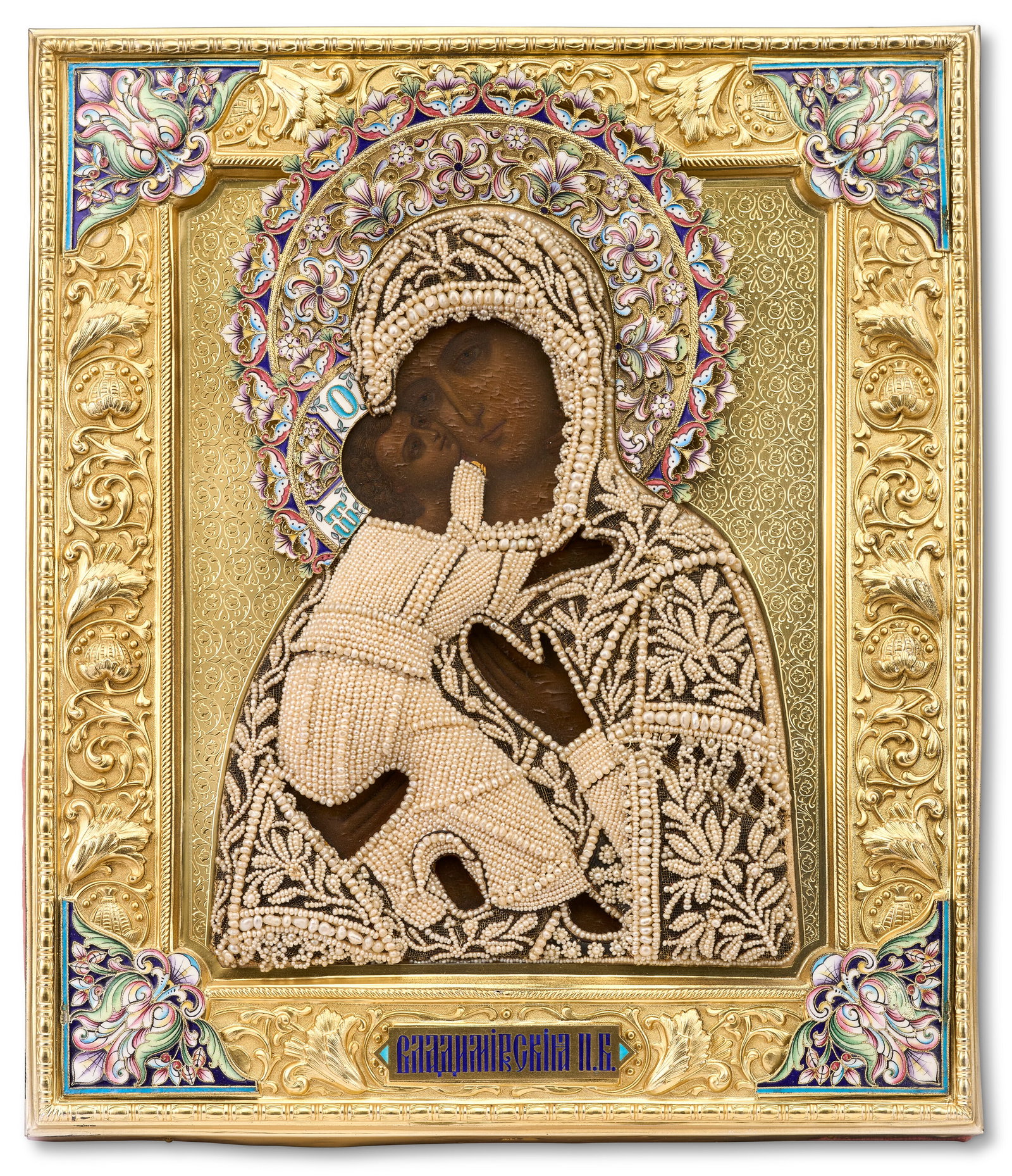 A RUSSIAN CLOISONNÉ AND CHAMPLEVÉ ENAMEL, SEED-PEARL SILVER-GILT ICON OF THE MOTHER OF GOD (1 of 3)