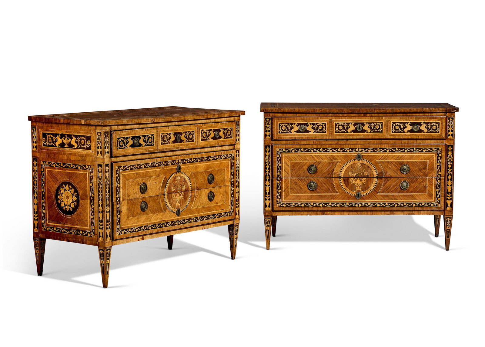 A PAIR OF NORTH ITALIAN WALNUT, FRUITWOOD AND MARQUETRY COMMODES LOMBARDY, CIRCA 1790-1800 (1 of 6)