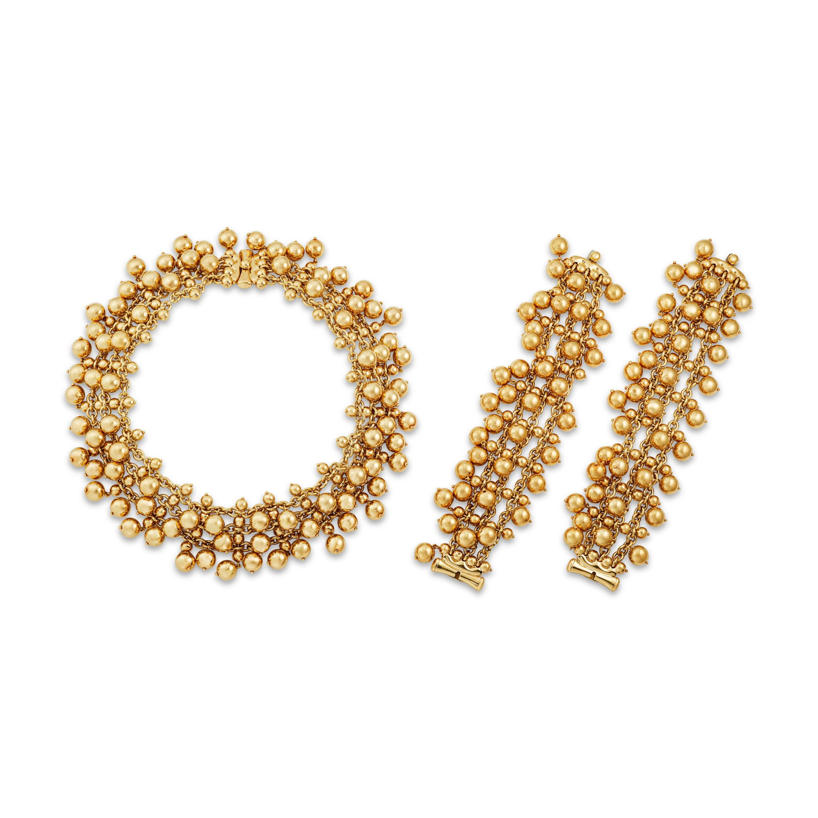 BULGARI SUITE OF GOLD 'NATURALIA' JEWELLERY: BULGARI SUITE OF GOLD 'NATURALIA' JEWELLERY Details Comprising a necklace and two bracelets 18k yellow gold (Italian marks), signed Bvlgari, bracelets with Bulgari cases Size/Dimensions: necklace 38.5