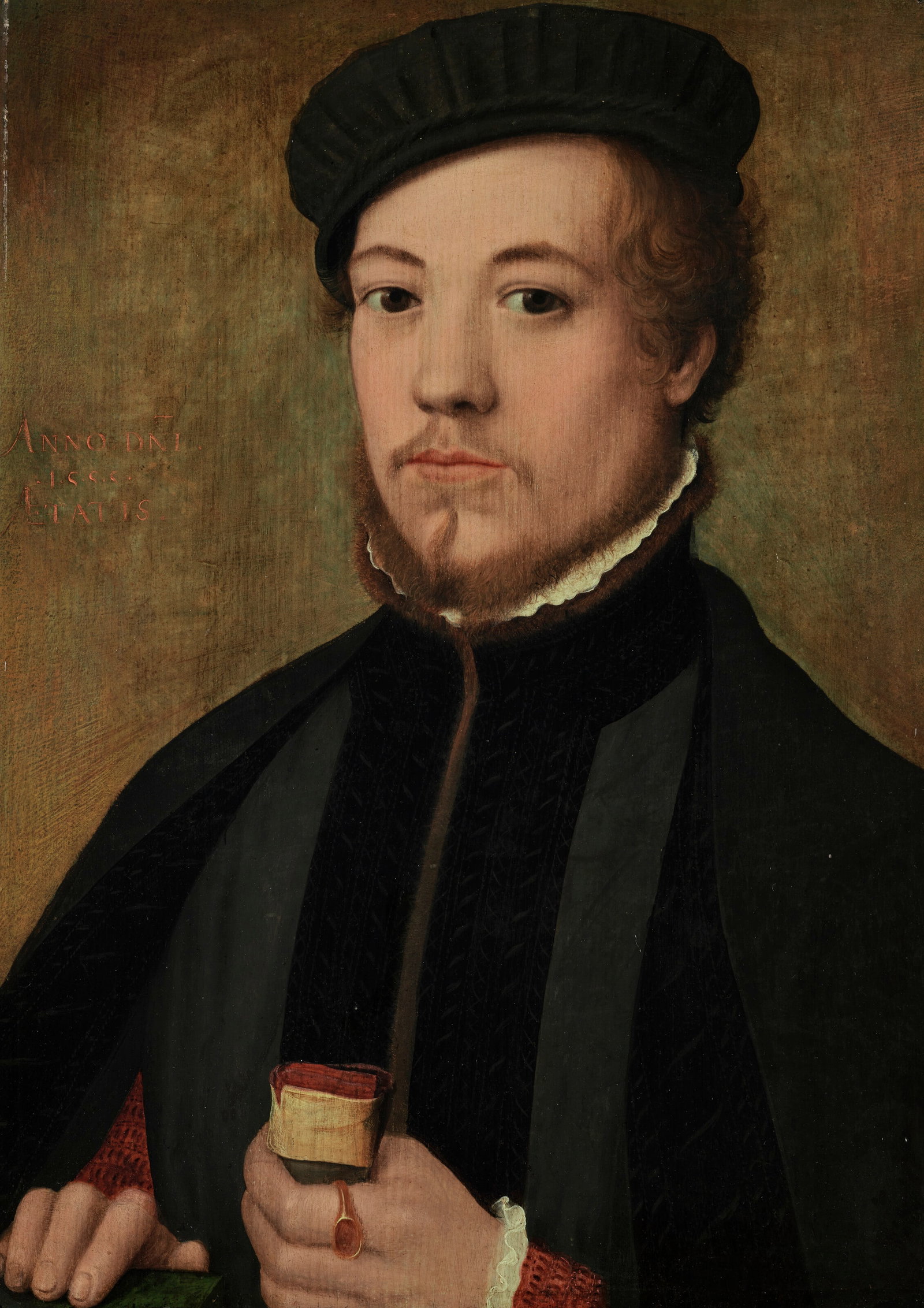 FLEMISH SCHOOL, 1555 Portrait of a gentleman, bust-length, in a black doublet and cap, holding a (1 of 4)