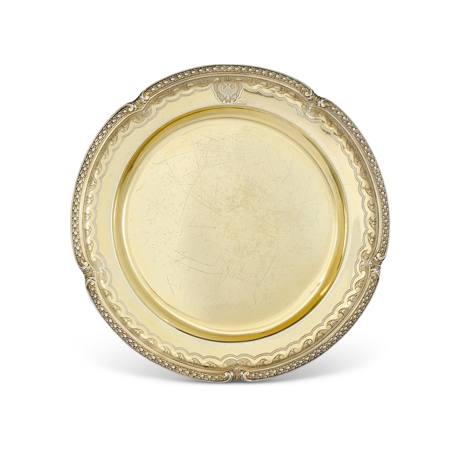 PLAT RUSSE EN VERMEIL DU SERVICE ORLOFF: Details PLAT RUSSE EN VERMEIL DU SERVICE ORLOFF BY NICHOLLS AND PLINKE, ESSAYEUR ROBERT KOKHUN, ST PETERSBURG, 1859 Circulaire, à contours chantournés ornés de feuilles de laurier en gr
