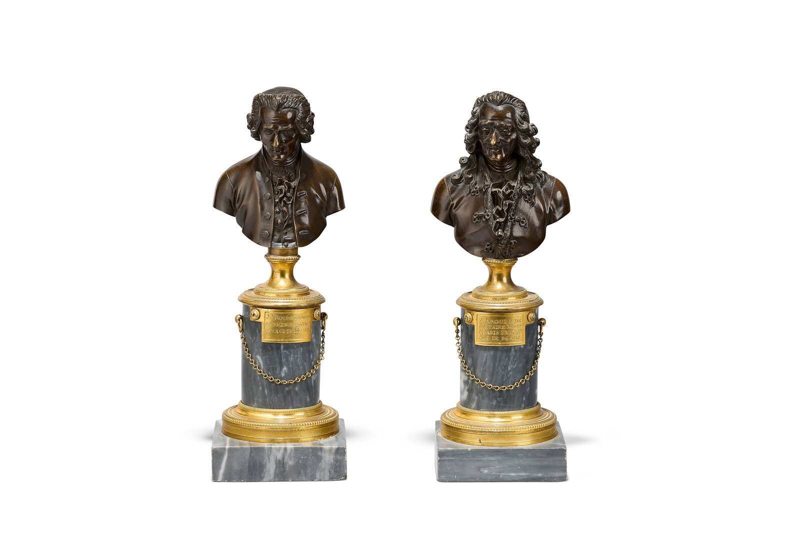 D'APRÈS FRANÇOIS MARIE SUZANNE (1750–1802), DÉBUT DU XIXE SIÈCLE: Details D'APRÈS FRANÇOIS MARIE SUZANNE (1750–1802), DÉBUT DU XIXE SIÈCLE Rousseau et Voltaire paire de bustes en bronze patiné, reposant sur une colonne en marbre bleu t