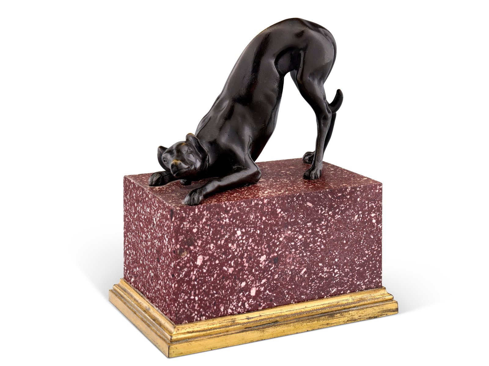 XIXE OU XXE SIÈCLE: Details XIXE OU XXE SIÈCLE Lévrier jouant bronze, reposant sur une socle associé en porphyre et monture en bronze doré H. totale : 14,5 cm. (5 ¾ in.) Provenance Paul Wallraf (