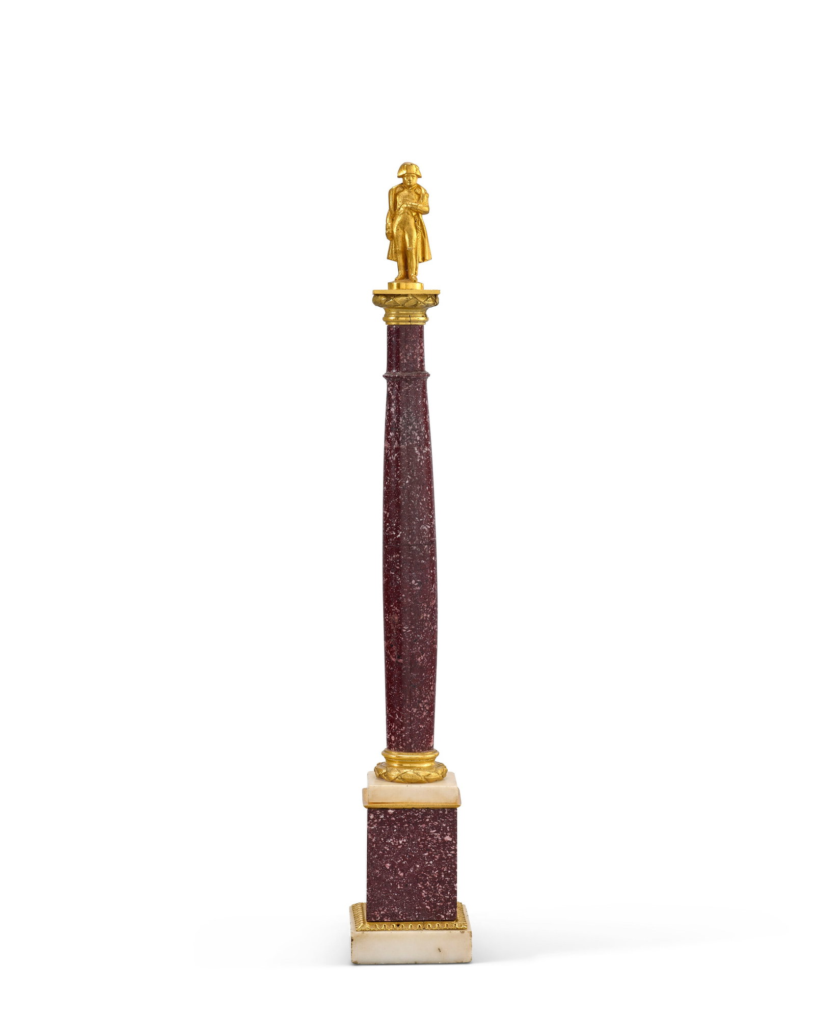 FRANCE, XXE SIÈCLE: Details FRANCE, XXE SIÈCLE Colonne surmontée de la figure de Napoléon Ier porphyre et bronze doré, reposant sur une base en porphyre, marbre blanc et bronze doré H. totale : 4