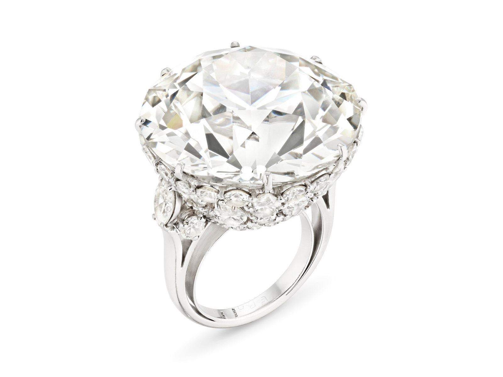 AN IMPRESSIVE COLORED DIAMOND AND DIAMOND RING: Details AN IMPRESSIVE COLORED DIAMOND AND DIAMOND RING Very light green-yellow old European brilliant-cut diamond of 49.91 carats, marquise and round diamonds, platinum, circa 1970 GIA, 2026, report n