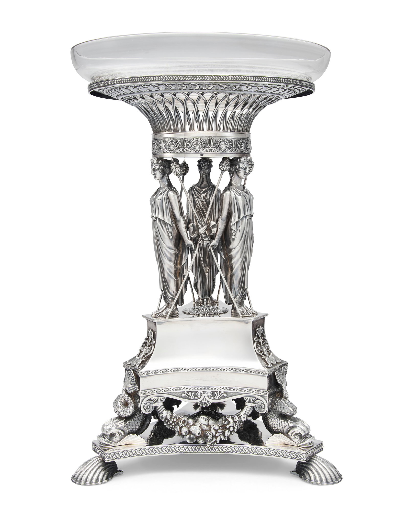 A REGENCY SILVER DESSERT STAND MARK OF PAUL STORR, LONDON, 1813: Details A REGENCY SILVER DESSERT STAND MARK OF PAUL STORR, LONDON, 1813 On a shaped triangular base with shell feet, the upper pedestal raised on the backs of dolphins and applied with fruit and flora