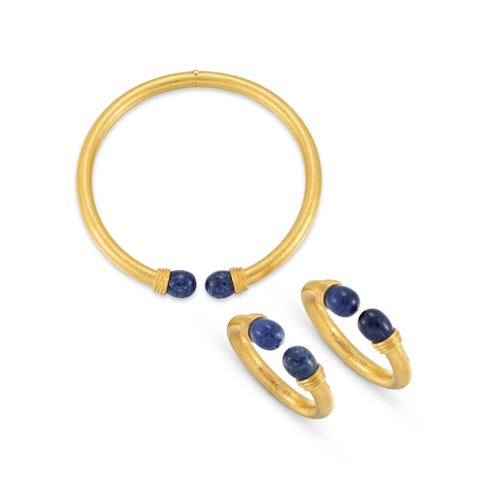 LALAOUNIS SODALITE SUITE: Details Comprising a torque necklace and a pair of bangles Of hammered finish, polished sodalite beads, signed Ilias Lalounis, maker’s marks (Lalaounis) Size/Dimensions: necklace inner