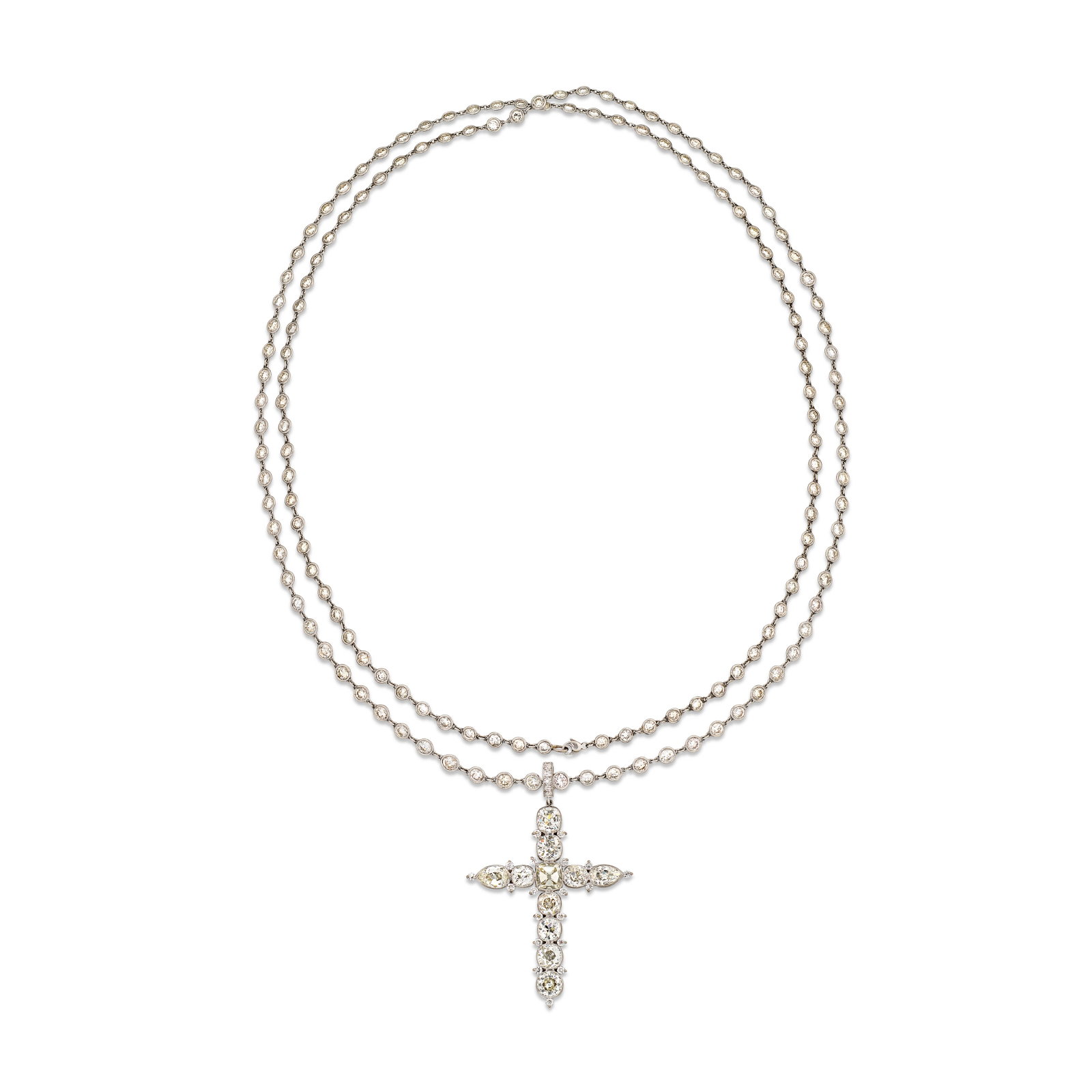 DIAMOND CROSS PENDENT NECKLACE: Details Old circular-, pear- and cushion-shaped diamonds Size/Dimensions: chain 126.0 cm, cross pendant 7.5 cm (including bail), cross element 6.2 x 5.0 cm Gross Weight: 38.1 grams