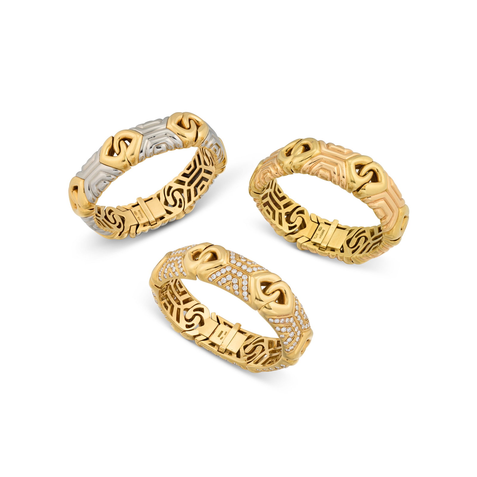 BULGARI THREE 'DOPPIO CUORE' BRACELETS: Details One bracelet with circular-cut diamonds, the other two bracelets with alternating polished links, each signed Bvlgari, maker's marks (Bulgari Gioielli spa) Size/Dimensions: bracelets each