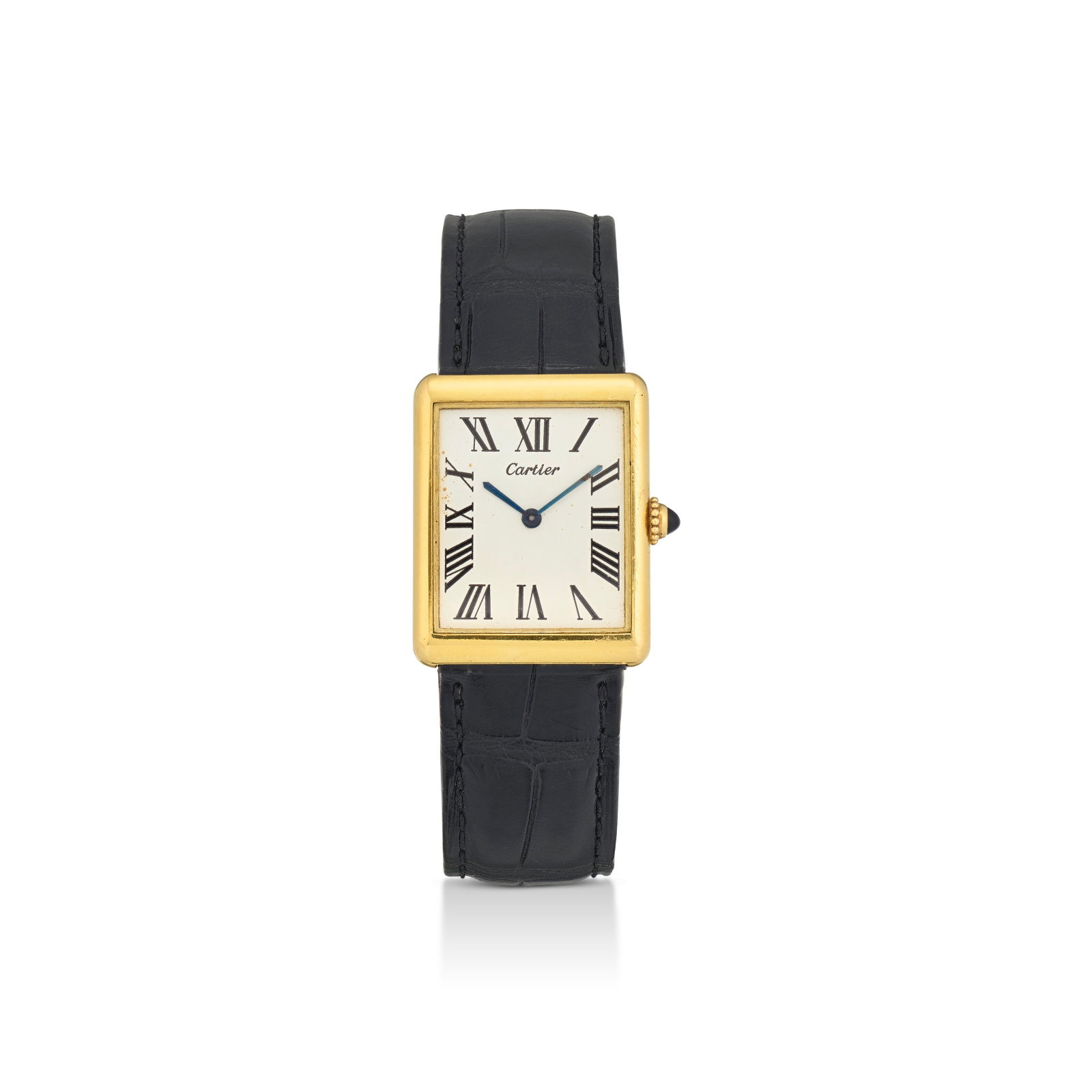 CARTIER GOLD 'TANK RECTANGLE' WRISTWATCH: Details Cabochon sapphire crown, gold (British and London hallmarks), 1975, manual winding movement, dial signed Cartier, movement signed Jaeger-LeCoultre, buckle with maker's marks (Jacques Cartier),
