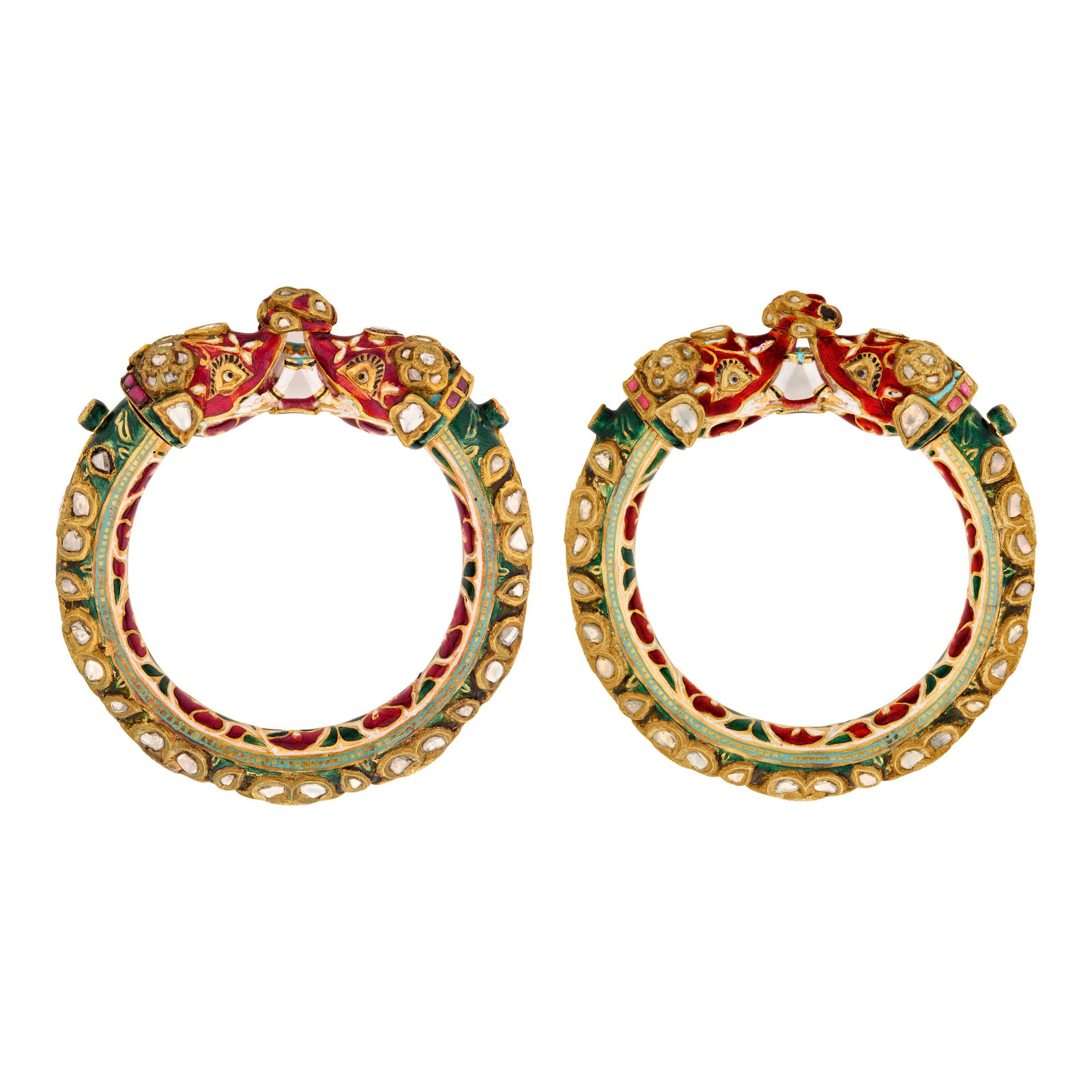 PAIR OF INDIAN ENAMEL, DIAMOND AND RUBY MAKARA BRACELETS: PAIR OF INDIAN ENAMEL, DIAMOND AND RUBY MAKARA BRACELETS Details Each designed as two elephants with interlocking trunks, enamel, table and rose-cut diamonds, variously-shaped rubies, yellow gold,