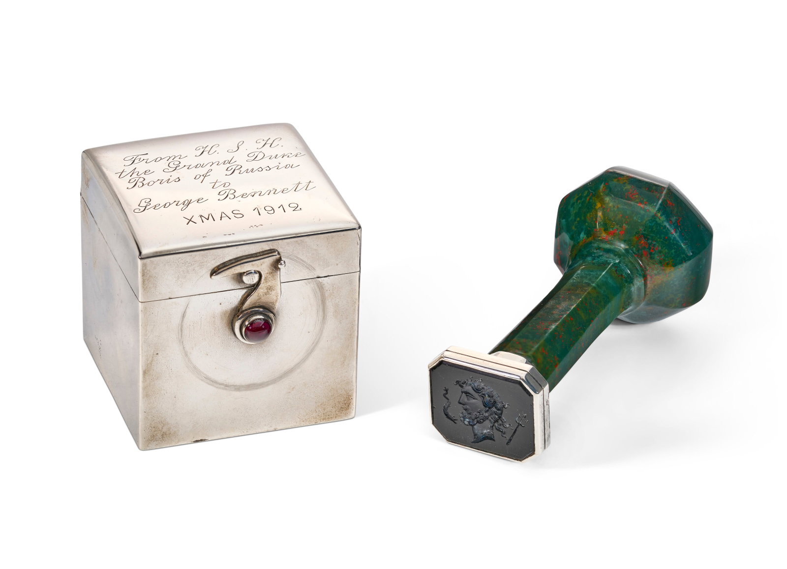 A SILVER-MOUNTED BLOODSTONE HAND SEAL AND A RUSSIAN SILVER INKWELL THE HAND SEAL, PROBABLY ENGLISH (1 of 4)