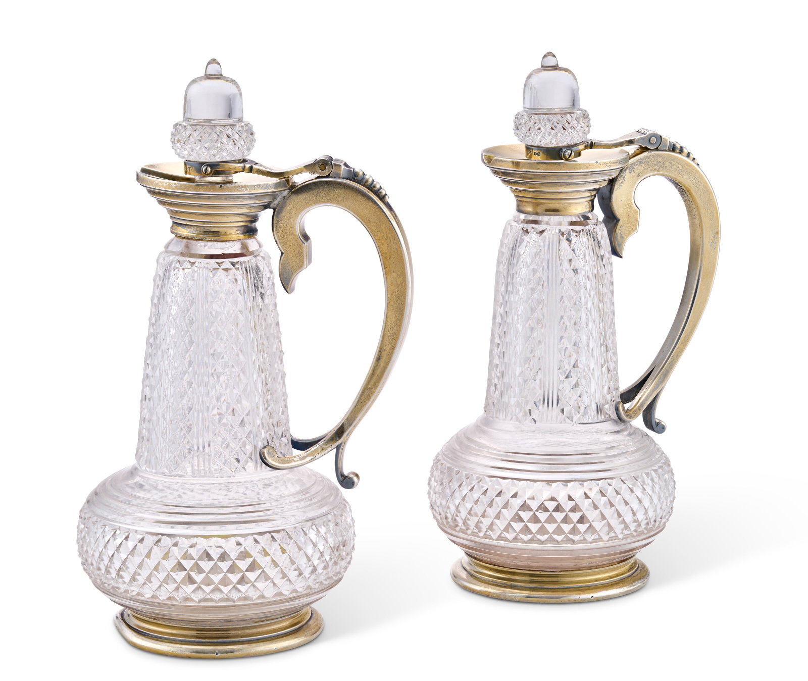 TWO VICTORIAN SILVER-GILT MOUNTED CUT-GLASS CLARET JUGS MARK OF HENRY WILLIAM DEE, LONDON, 1877 AND (1 of 1)