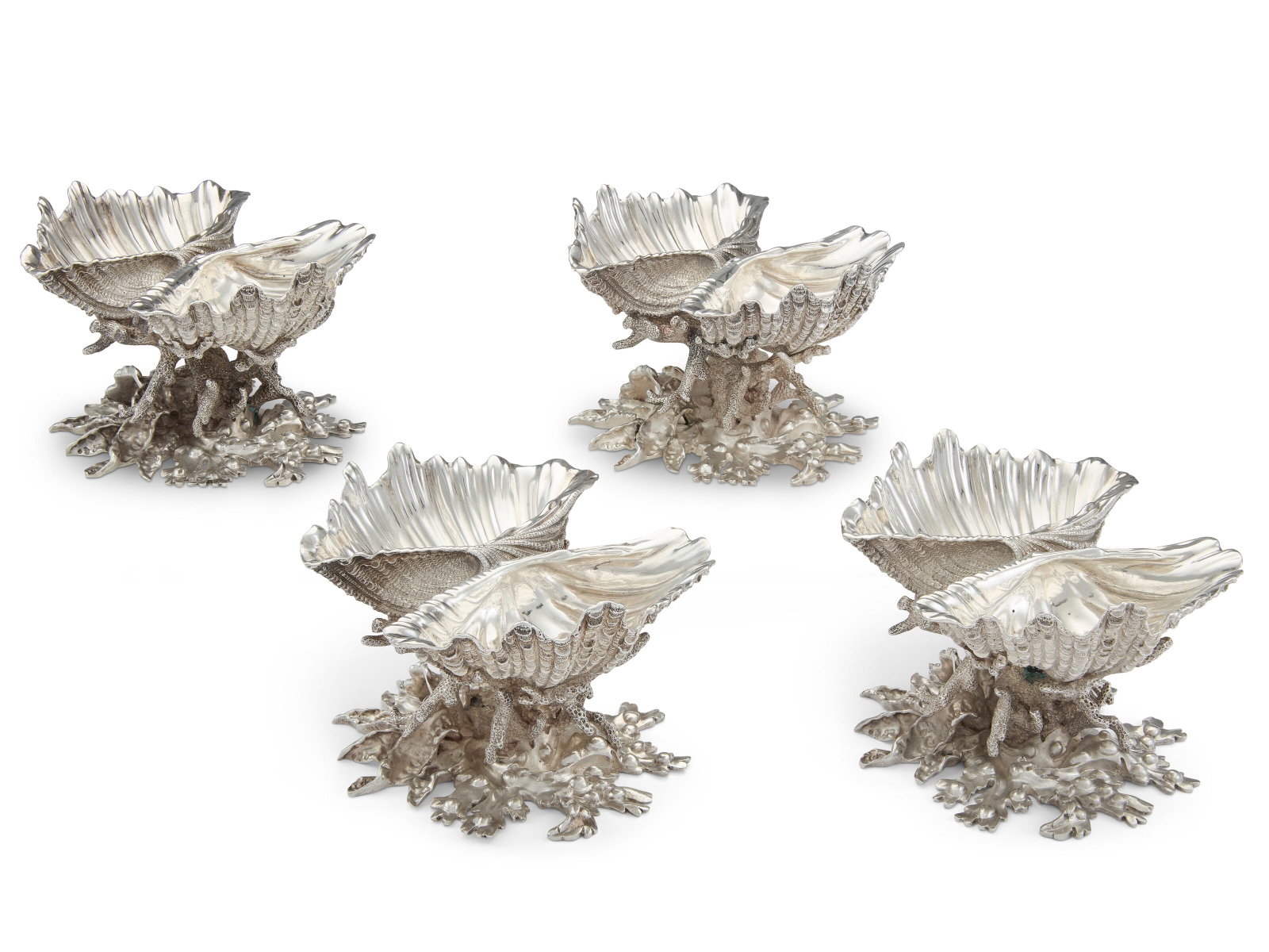 A SET OF FOUR WILLIAM IV SILVER DOUBLE SALT CELLARS MARK OF PAUL STORR, LONDON, 1833: A SET OF FOUR WILLIAM IV SILVER DOUBLE SALT CELLARS MARK OF PAUL STORR, LONDON, 1833 Details Each formed as two halves of a clam shell raised on stems and bases naturalistically cast and chased as cor