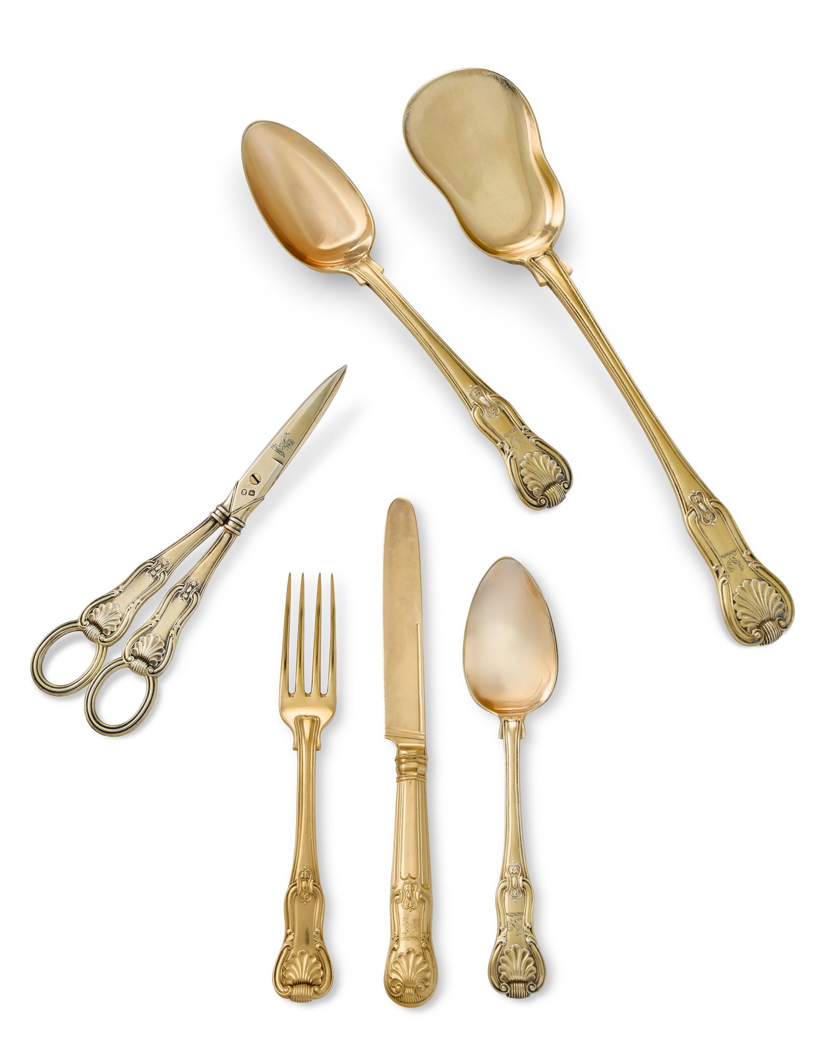 A REGENCY SILVER-GILT DESSERT SERVICE MARK OF PAUL STORR, LONDON, 1815: A REGENCY SILVER-GILT DESSERT SERVICE MARK OF PAUL STORR, LONDON, 1815 Details Fiddle thread and shell pattern, engraved on the reverse of terminals with a crest, comprising: Eighteen dessert spoons E