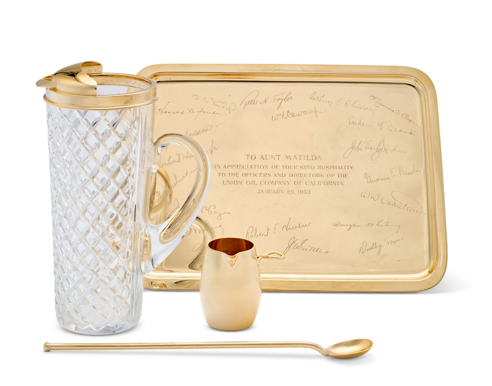 AN AMERICAN GOLD FOUR-PIECE MARTINI SET MARK OF TIFFANY & CO., NEW YORK, CIRCA 1953, 14 KARAT: AN AMERICAN GOLD FOUR-PIECE MARTINI SET MARK OF TIFFANY & CO., NEW YORK, CIRCA 1953, 14 KARAT Details Comprising a cut glass martini pitcher with gold rim and spout, a stirring spoon, a small jug, and