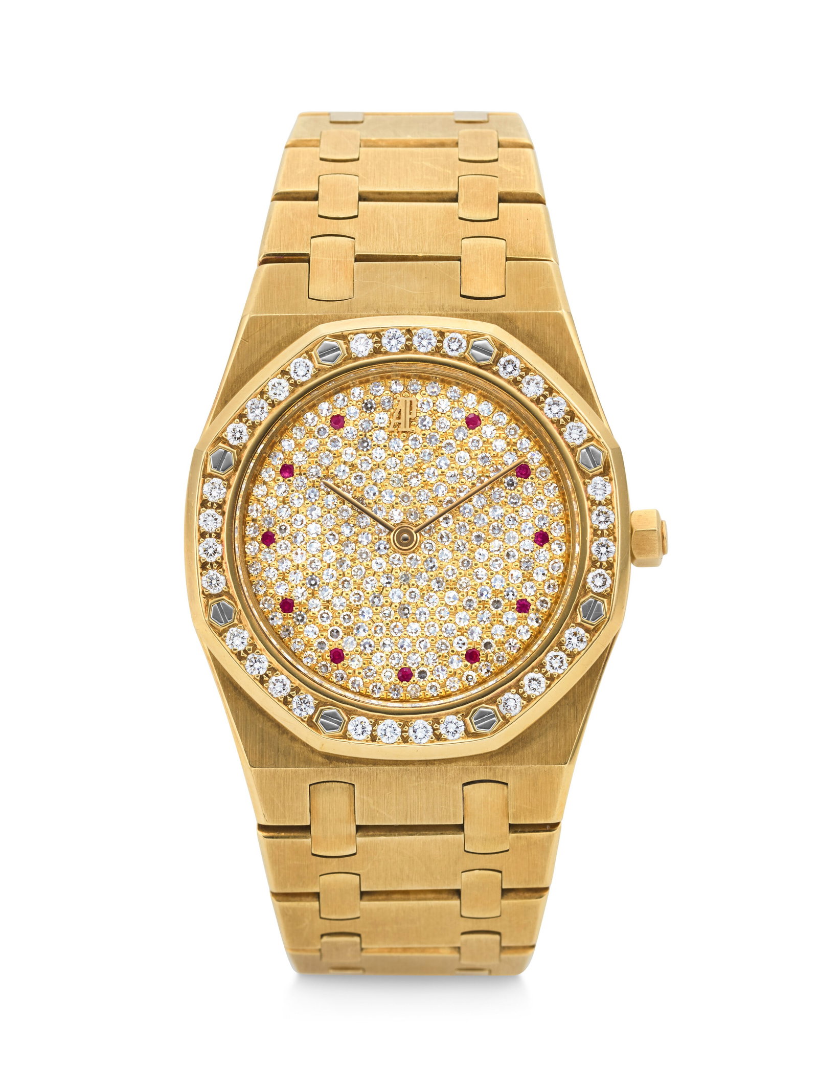 AUDEMARS PIGUET. A VERY RARE AND EYE-CATCHING 18K GOLD AND DIAMOND-SET QUARTZ WRISTWATCH WITH: AUDEMARS PIGUET. A VERY RARE AND EYE-CATCHING 18K GOLD AND DIAMOND-SET QUARTZ WRISTWATCH WITH INTEGRATED BRACELET WITH PAVÉ DIAMOND AND RUBY DIAL ROYAL OAK MODEL, REF. 56342BA, MOVEMENT NO. 308'2