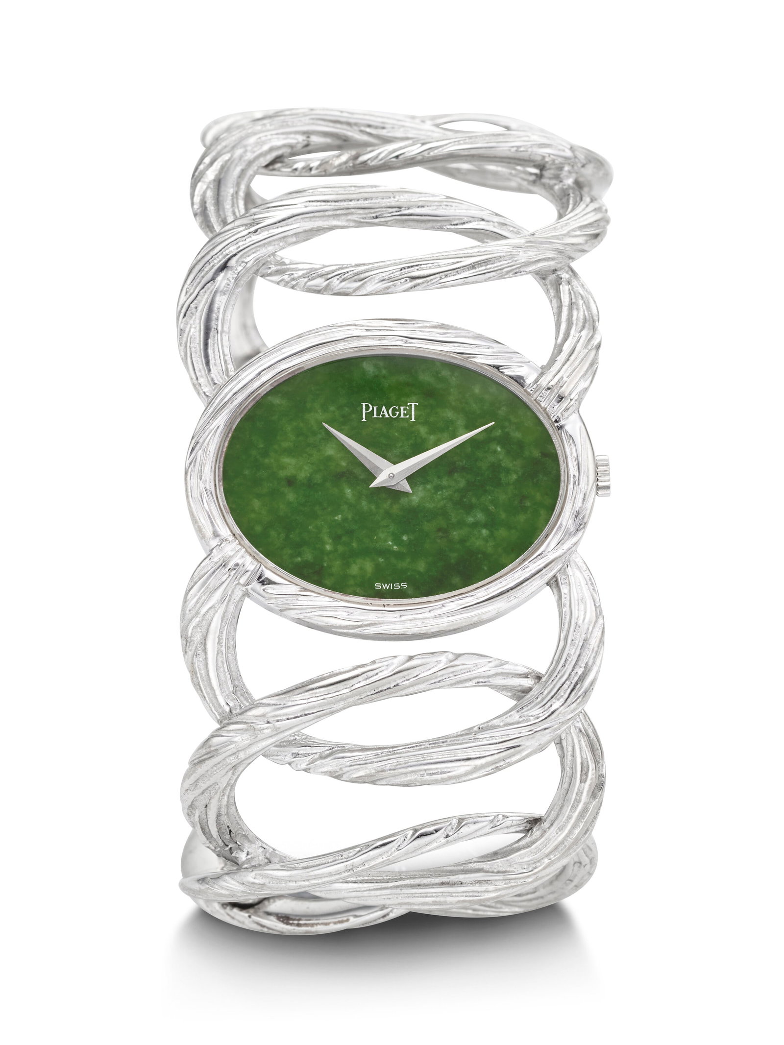 PIAGET. A WHIMSICAL AND EYE-CATCHING 18K WHITE GOLD BRACELET CUFF WATCH WITH GREEN NEPHRITE DIAL: PIAGET. A WHIMSICAL AND EYE-CATCHING 18K WHITE GOLD BRACELET CUFF WATCH WITH GREEN NEPHRITE DIAL 21st CENTURY COLLECTION, REF. 9852 D65, MOVEMENT NO. 696'941, CASE NO. 169'710, DELIVERED IN 1969 Detai