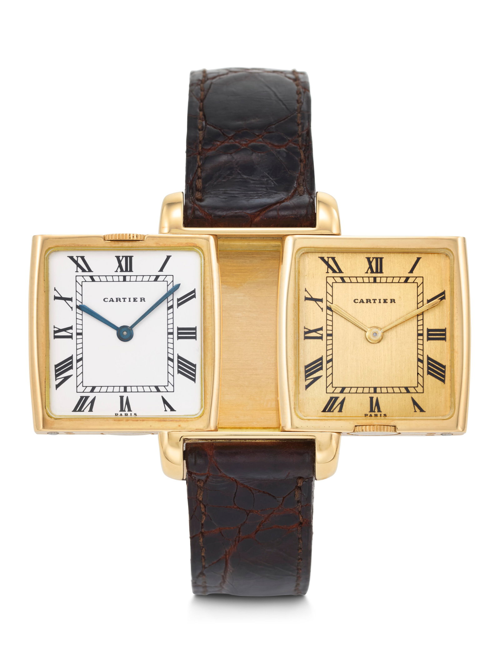 CARTIER. AN EXTREMELY RARE AND ELEGANT DUAL TIME REVERSIBLE WRISTWATCH WITH GOLD AND WHITE DIALS: CARTIER. AN EXTREMELY RARE AND ELEGANT DUAL TIME REVERSIBLE WRISTWATCH WITH GOLD AND WHITE DIALS REVERSO 'DUAL TIME' PARIS MODEL, CASE NO. 035'443, 8 652, CIRCA 1970s Details CARTIER. AN EXTREMELY RAR