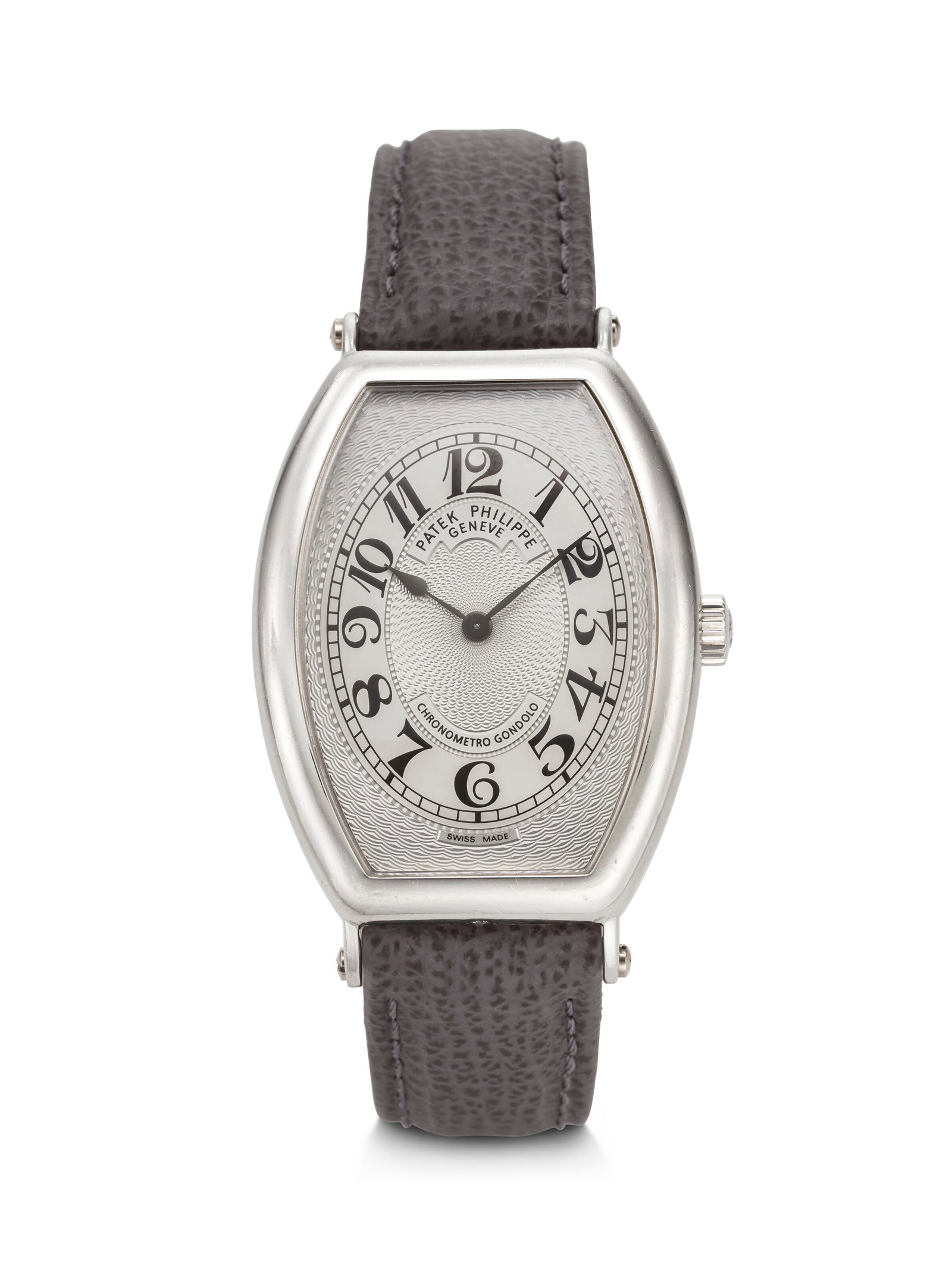 PATEK PHILIPPE. AN UNUSUAL AND ATTRACTIVE PLATINUM TONNEAU-SHAPED WRISTWATCH WITH GUILLOCHÉ (1 of 4)