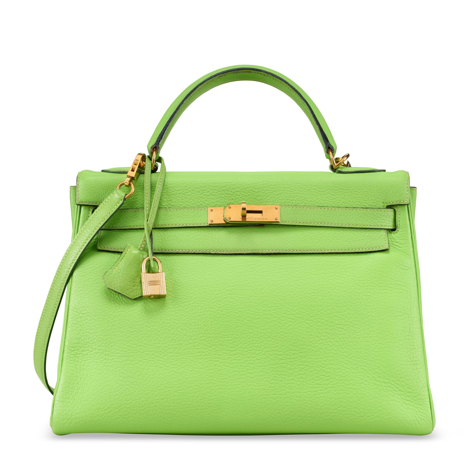 A VERT CRU CLÉMENCE LEATHER RETOURNE KELLY 32 WITH GOLD HARDWARE HERMÈS, 2002: Details GRADE: 3 32 w x 23 h x 10 d cm Includes lock, keys, clochette, shoulder strap, dust bag, and rain protector.