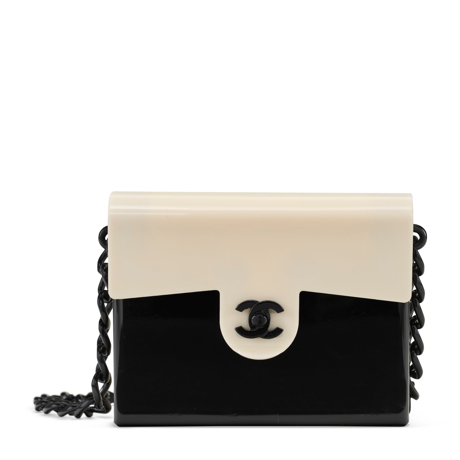 A BLACK & CREME LUCITE MINI SQUARE FLAP BAG CHANEL, 2000-2002: Details GRADE: 3 17 w x 13.5 h x 5 d cm Includes dust bag. Provenance Sold to Benefit the Metropolitan Museum of Art, the Frick Collection, and the Morgan Library & Museum.