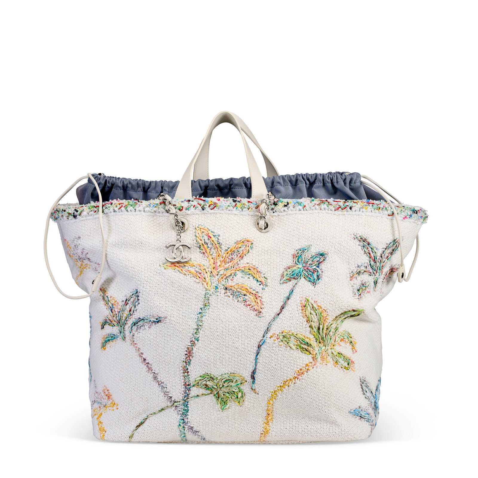 A WHITE & MULTICOLOR FLORAL EMBROIDERED TWEED AND CALFSKIN LEATHER WITH SILVER HARDWARE CHANEL, 2019: Details GRADE: 2.5 26 w x 29 h x 6 d cm Includes authenticity card and Christie's dust bag.