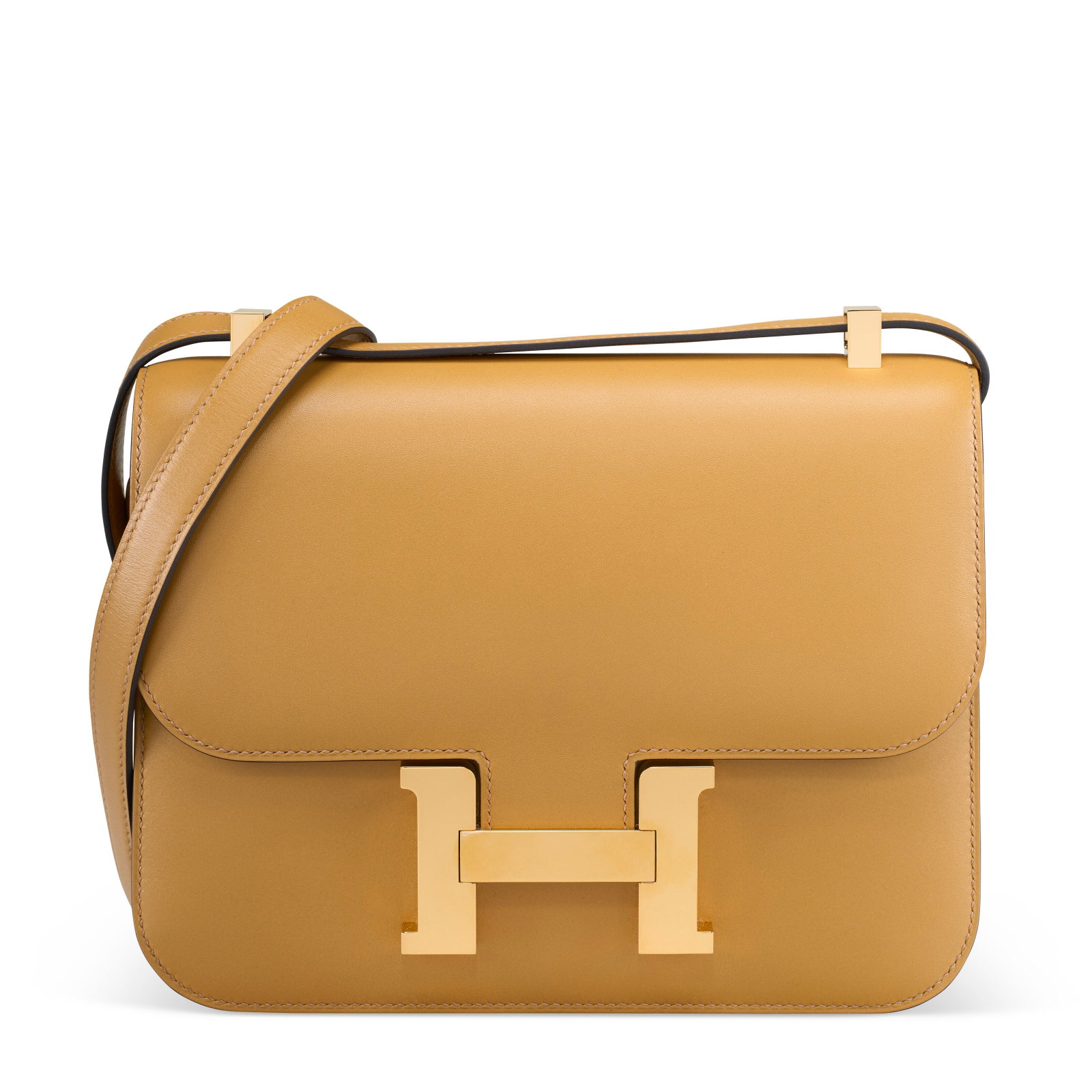 A POUSSIERE TADELAKT LEATHER CONSTANCE I-24 MIRROR WITH GOLD HARDWARE HERMÈS, 2022: Details GRADE: 1.5 23 w x 17 h x 6 d cm Includes mirror and Christie's dustbag