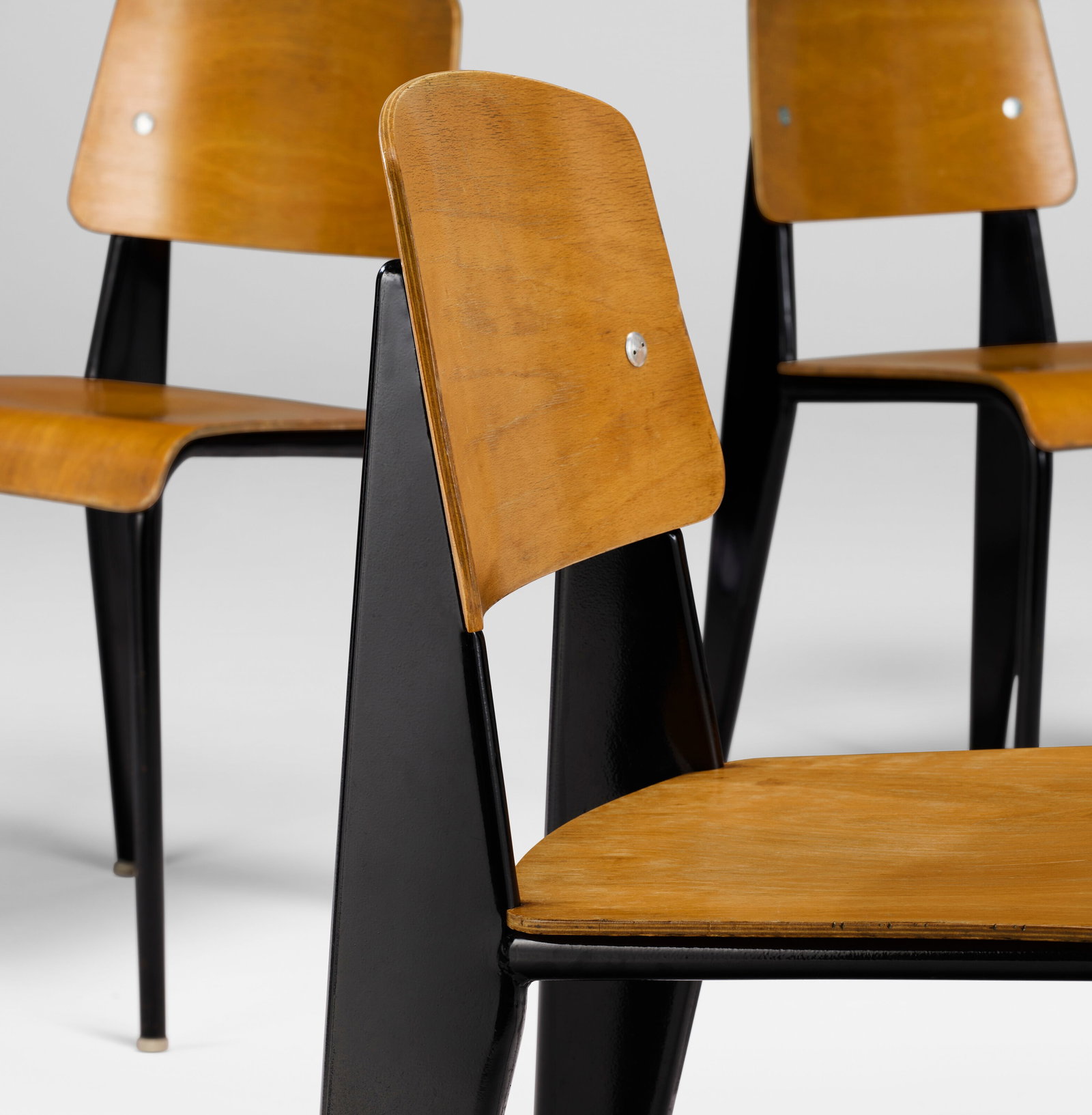 JEAN PROUVÉ (1901-1984) Set of Four 'Métropole' Chairs, Model No. 305, designed circa 1952 (1 of 4)