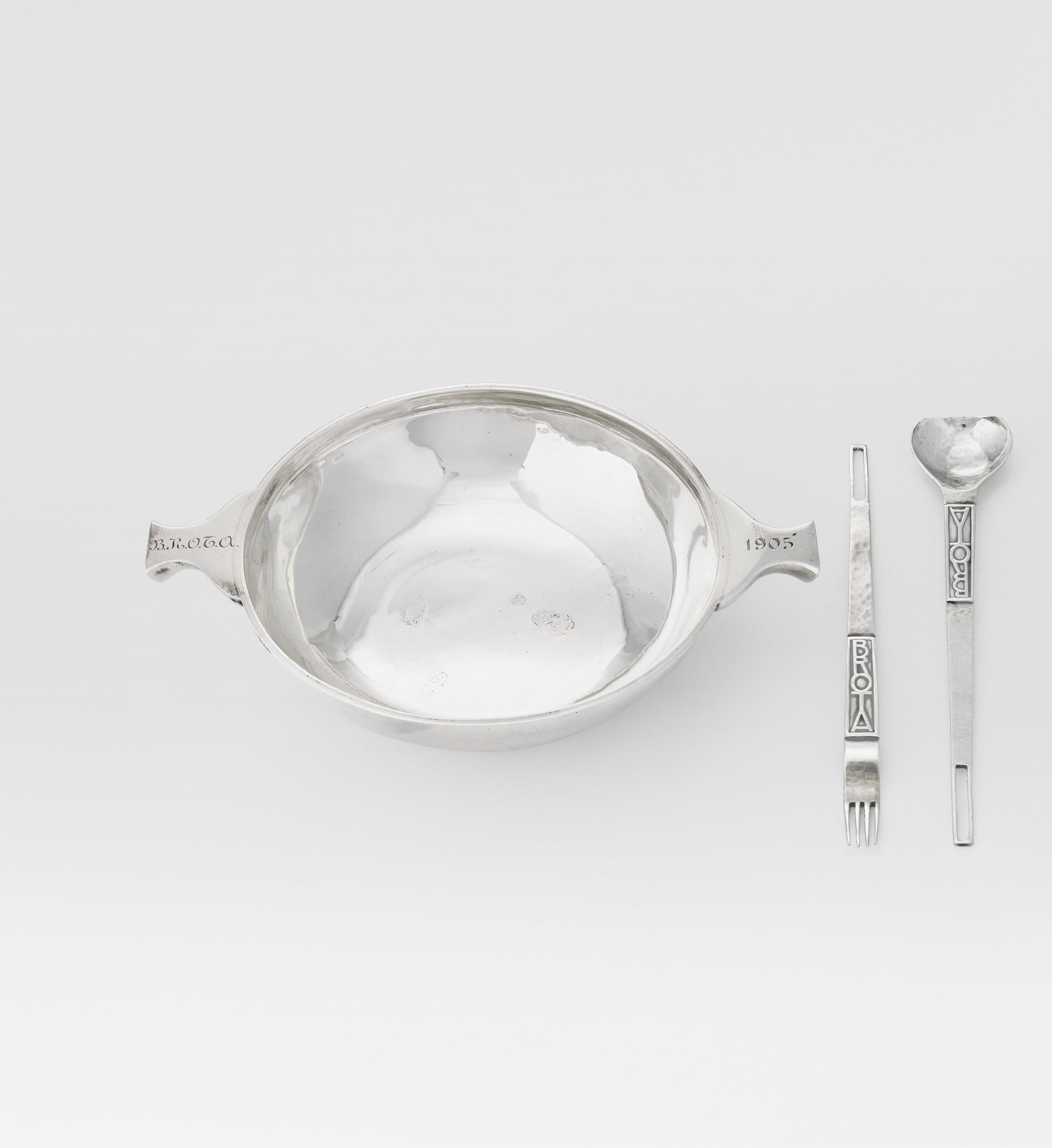 CHARLES RENNIE MACKINTOSH (1868-1928) Christening Set for Dr. Braccio Roberto Obermann Tosh: Details CHARLES RENNIE MACKINTOSH (1868-1928) Christening Set for Dr. Braccio Roberto Obermann Tosh Agnoletti, circa 1903-1905 mark of D. W. Hislop, Glasgow, 1905 comprising a spoon and a fork togethe