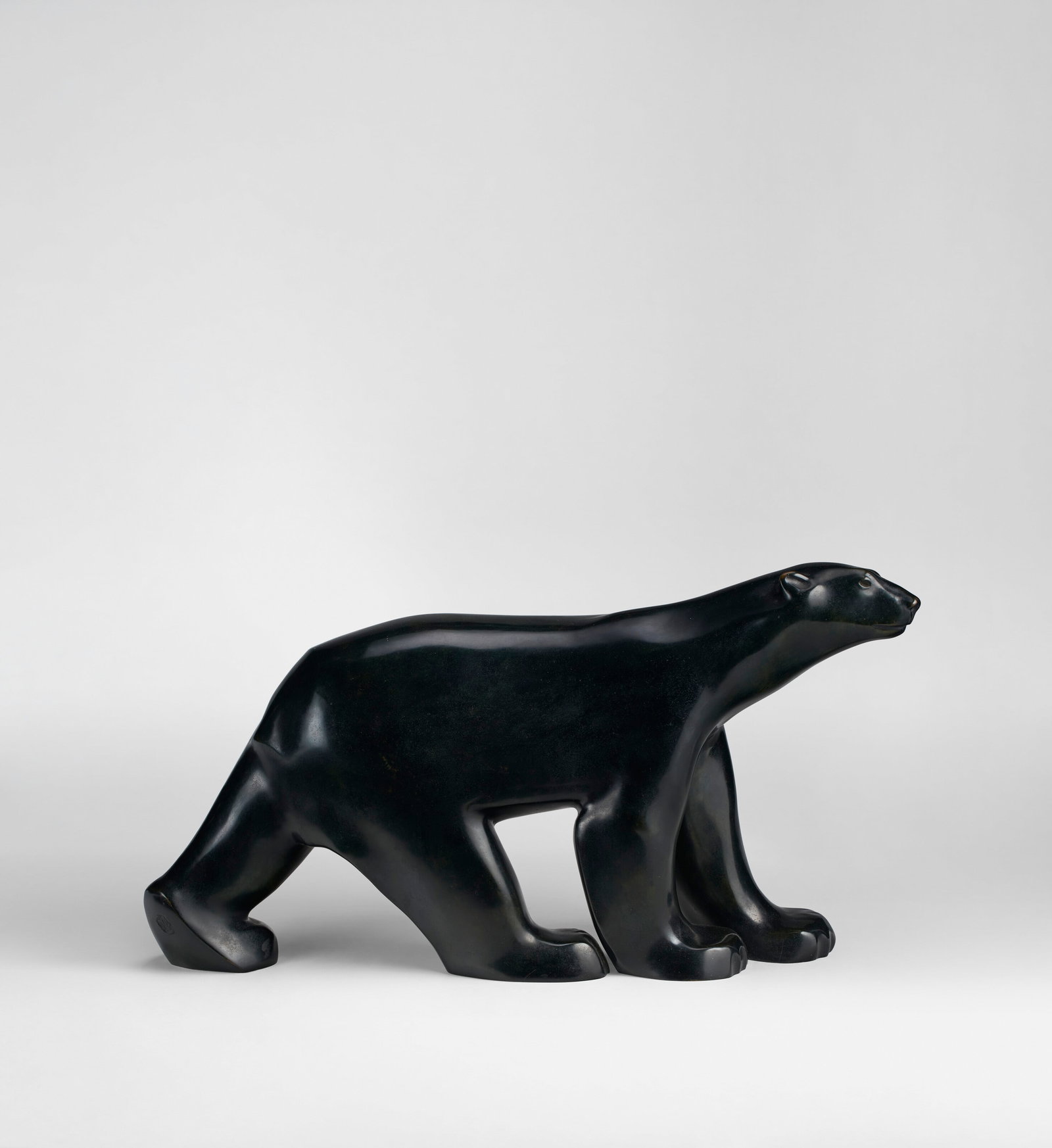 FRANÇOIS POMPON (1855-1933) 'Ours Blanc', designed 1921, posthumous cast: Details FRANÇOIS POMPON (1855-1933) 'Ours Blanc', designed 1921, posthumous cast patinated bronze 9 ½ x 17 ½ x 4 ½ in. (24.1 x 44.4 x 11.4 cm) signed POMPON, numbered 2⁄12 an