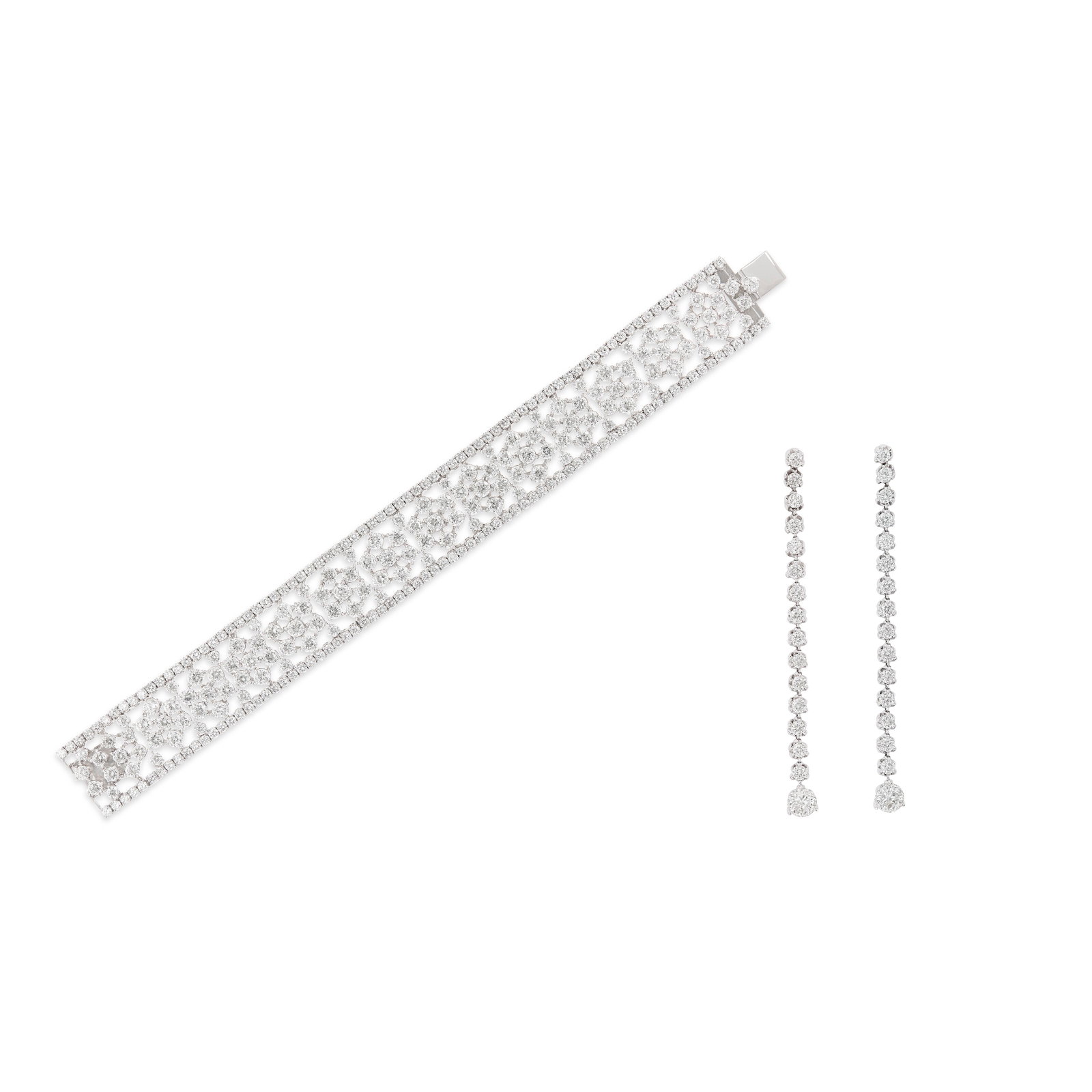 ROBERTO COIN SET OF DIAMOND AND RUBY 'CENTO' JEWELRY: Details Round diamonds and rubies, 18k white gold (each with Italian mark), earrings signed Roberto Coin, Italy, bracelet signed RC, Cento, Italy Diamonds (earrings): approximately 32 round with
