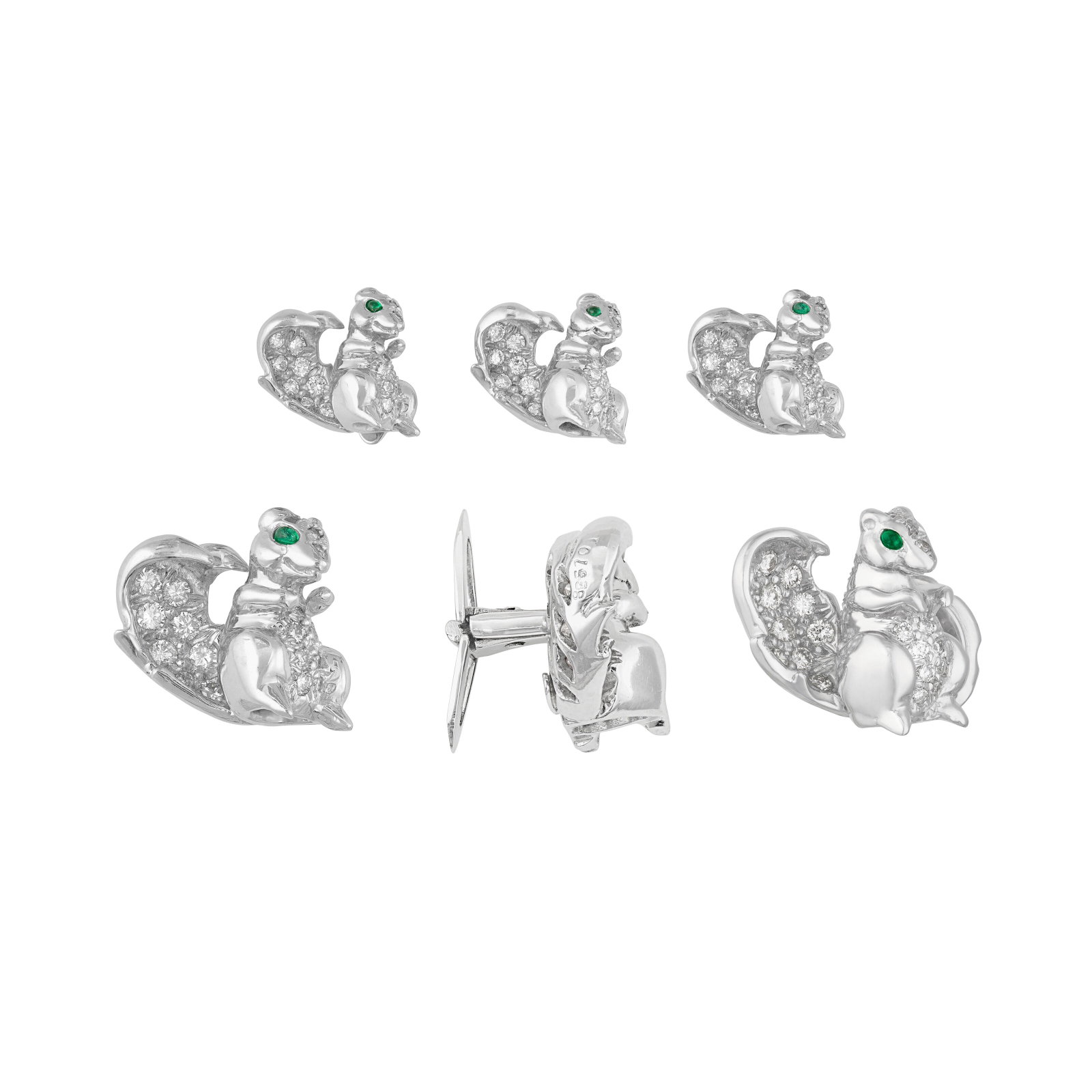 CARTIER DIAMOND AND EMERALD SQUIRREL DRESS SET: Details One pair of cufflinks, three shirtstuds and one pin each designed as squirrels, platinum and 18k white gold (French mark, pin back only), each signed Cartier, numbered Diamonds: approximately
