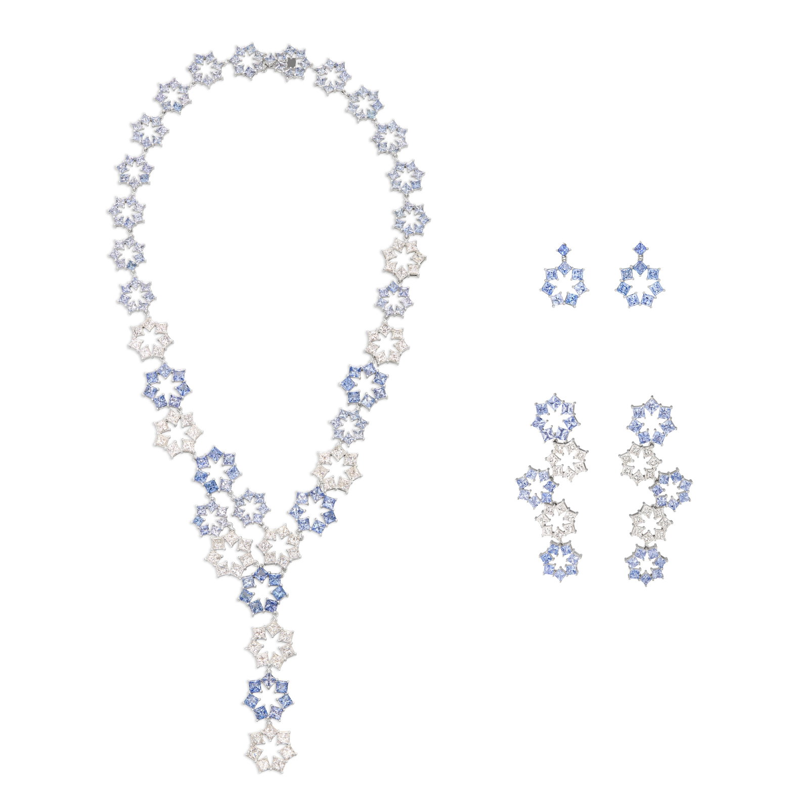 CHOPARD SET OF SAPPHIRE AND DIAMOND JEWELRY: Details Designed as a snowflake motif, rectangular sapphires, modified-cut diamonds, 18k white gold, each signed Chopard, each numbered Diamonds (necklace): 63 modified with an approximate total