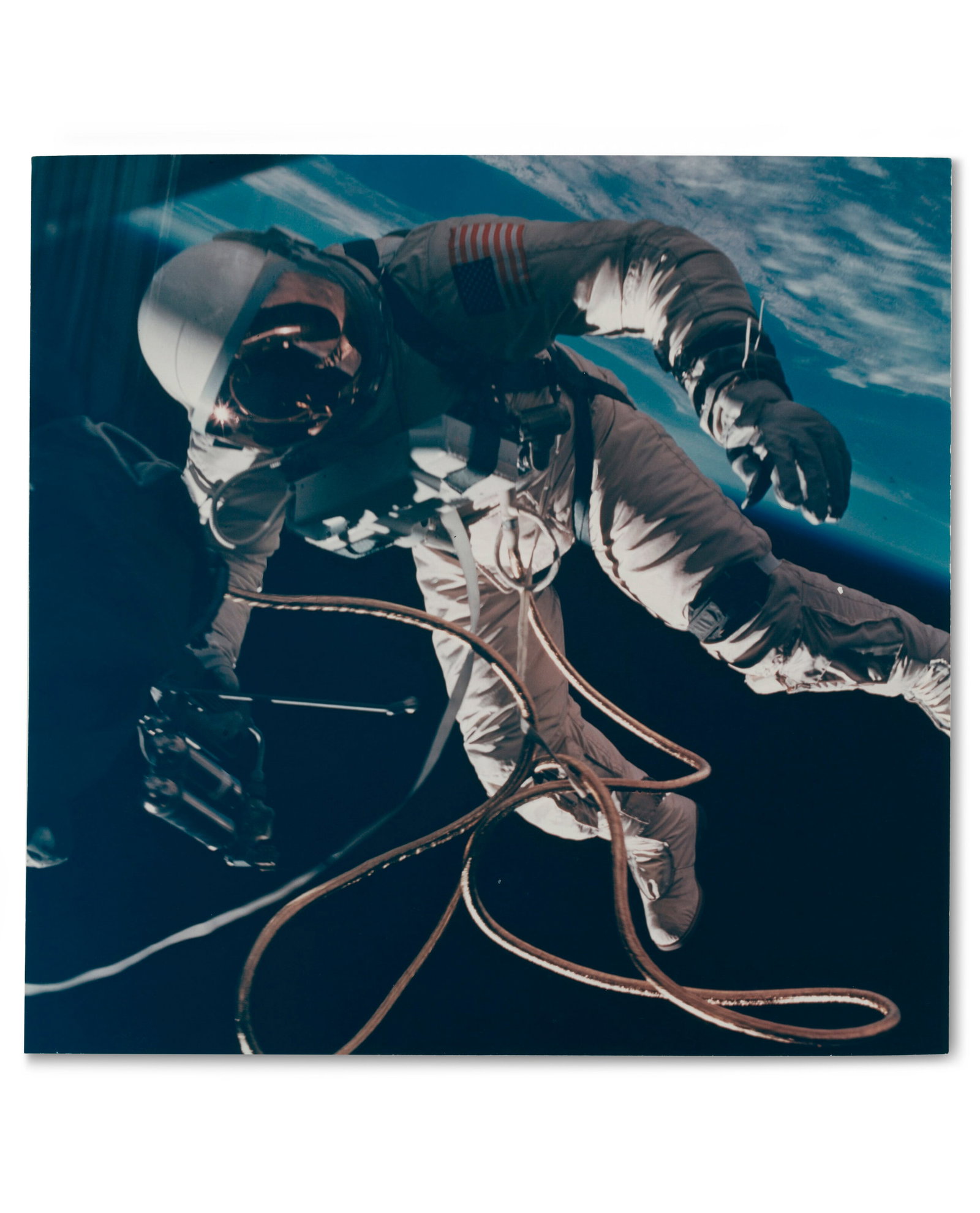 THE FIRST AMERICAN SPACE WALK: THE FIRST AMERICAN SPACE WALK NASA, 1965 Details THE FIRST AMERICAN SPACE WALK NASA, 1965 MCDIVITT, James (1929-2022), as commander of Gemini 4. Two vintage color photographs of Ed White's EVA over Ne