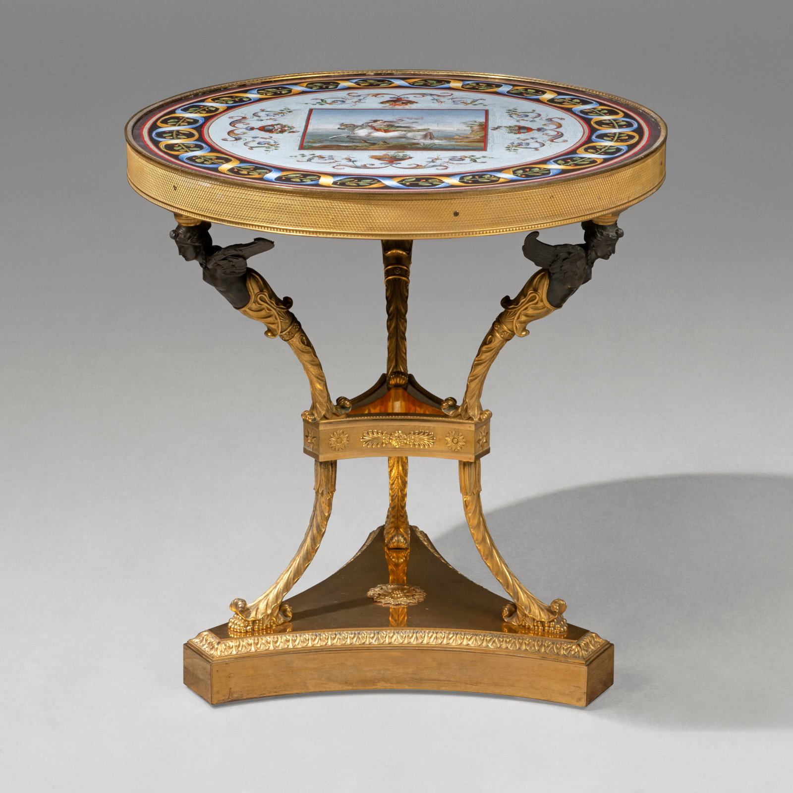 AN EMPIRE PATINATED-BRONZE, ORMOLU AND MICROMOSAIC GUERIDON THE MICROMOSAIC TOP ATTRIBUTED TO (1 of 7)