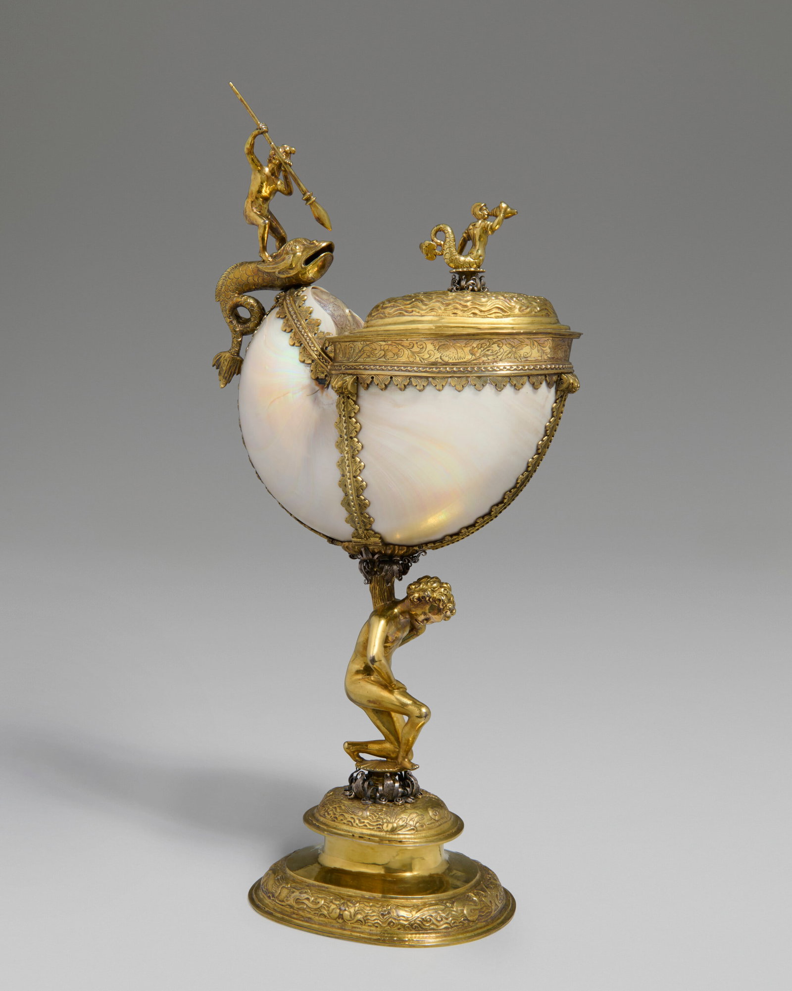 A CONTINENTAL PARCEL-GILT SILVER MOUNTED NAUTILUS SHELL CUP CENTRAL EUROPE, CIRCA 1640 (1 of 6)