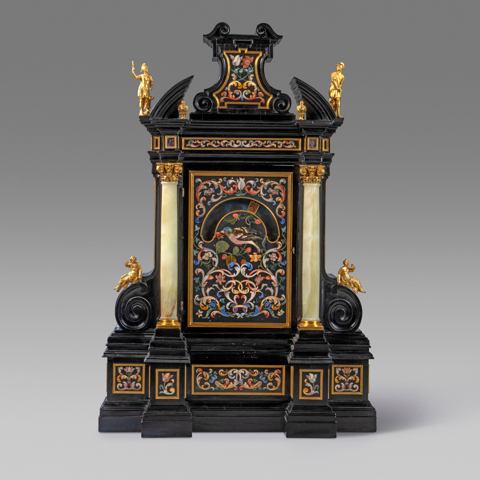 AN ITALIAN GILT-BRONZE-MOUNTED PIETRA DURA, ONYX AND EBONY 'NIGHT' CLOCK ATTRIBUTED TO THE GRAND (1 of 9)