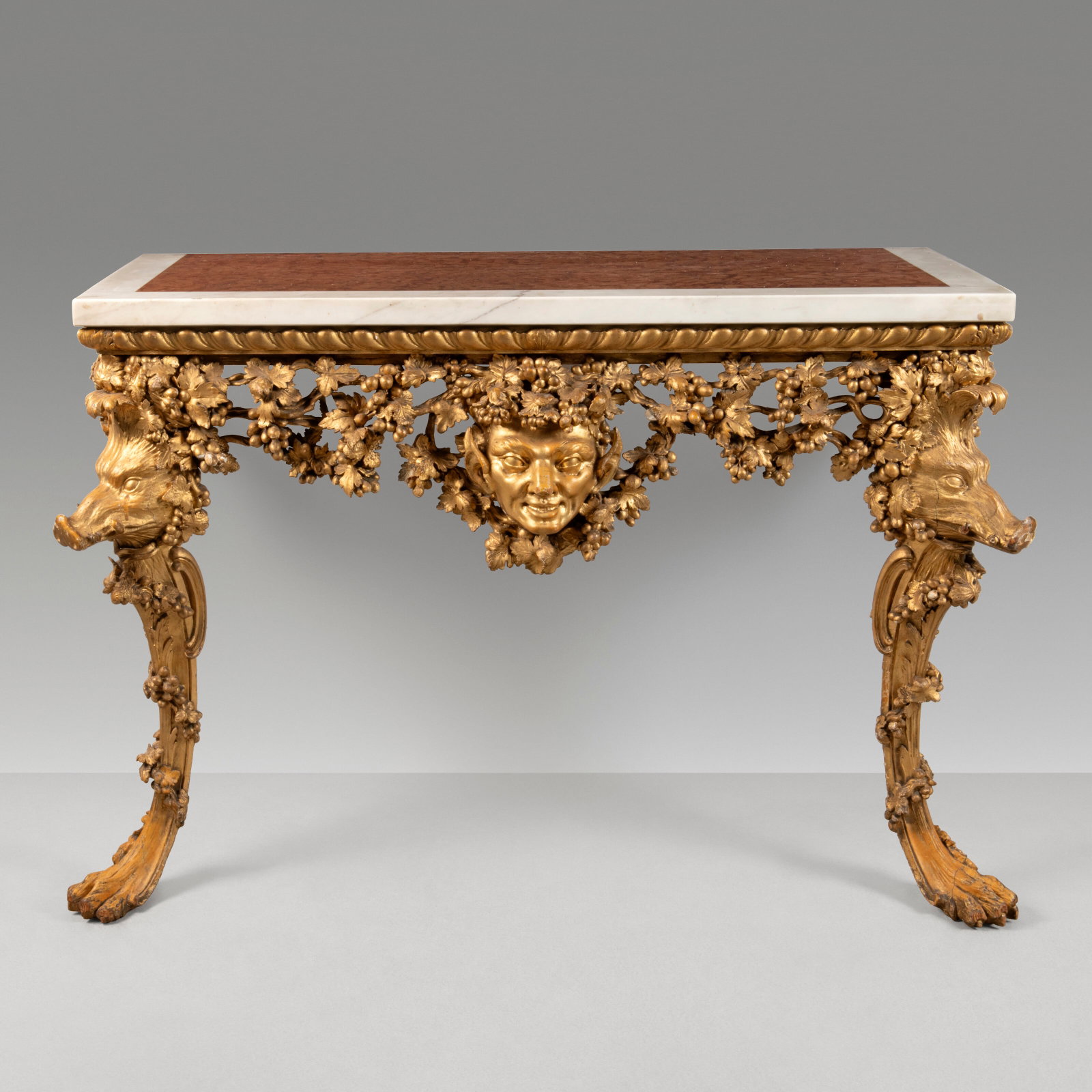 A PAIR OF GEORGE II GILTWOOD CONSOLE TABLES IN THE MANNER OF THOMAS JOHNSON, CIRCA 1745-55 (1 of 11)