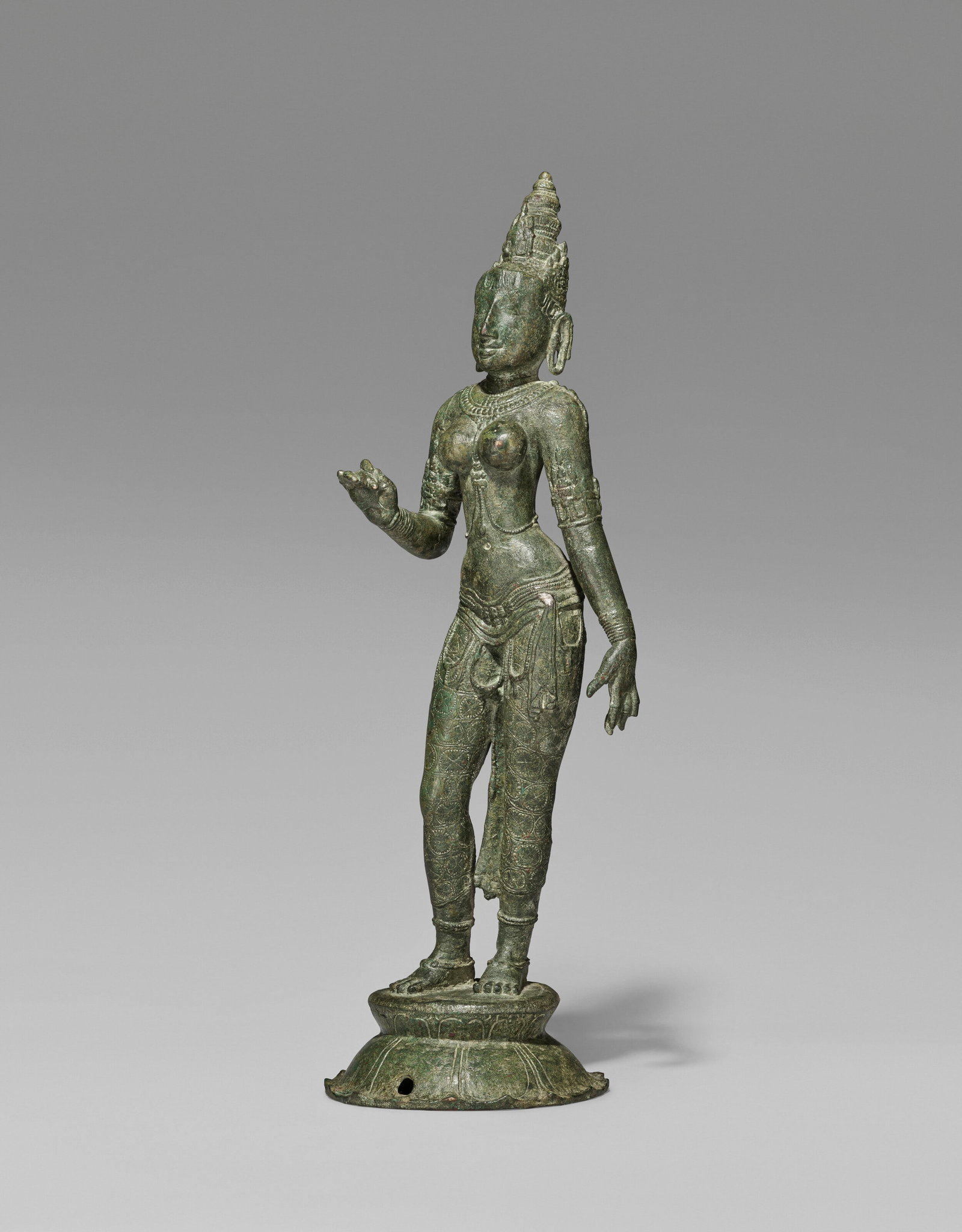 A COPPER ALLOY FIGURE OF PARVATI INDIA, TAMIL NADU, CHOLA PERIOD, 10TH CENTURY: Details A COPPER ALLOY FIGURE OF PARVATI INDIA, TAMIL NADU, CHOLA PERIOD, 10TH CENTURY 20 1⁄8 in. (51 cm) high Provenance Collection of C. T. Loo, Paris, acquired by 1938, Collection of Dr. W. M