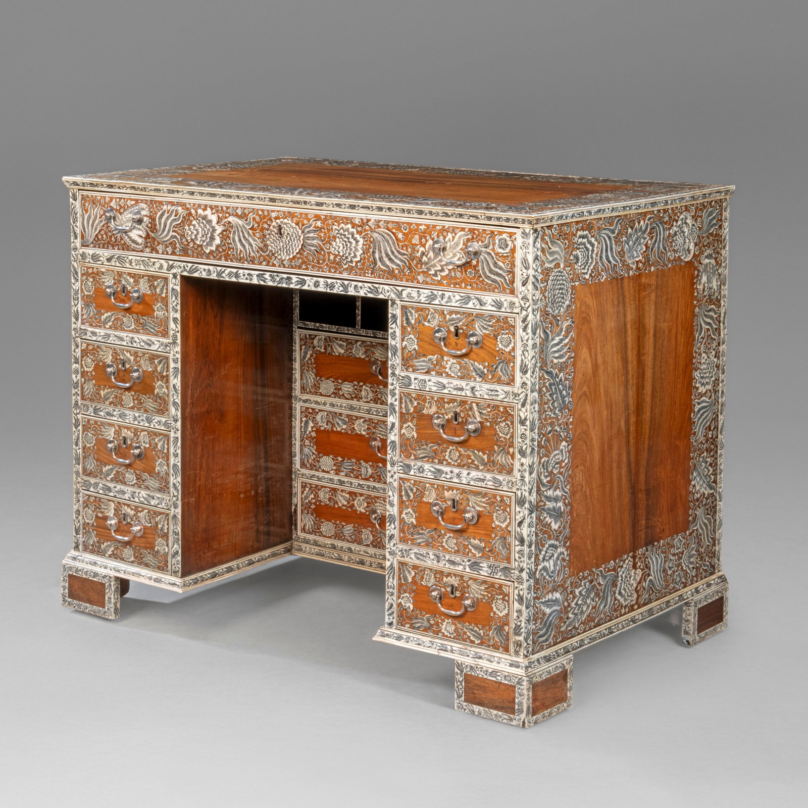 AN ANGLO-INDIAN ENGRAVED IVORY AND INDIAN ROSEWOOD DRESSING-BUREAU VIZAGAPATAM, CIRCA 1740-60 (1 of 13)