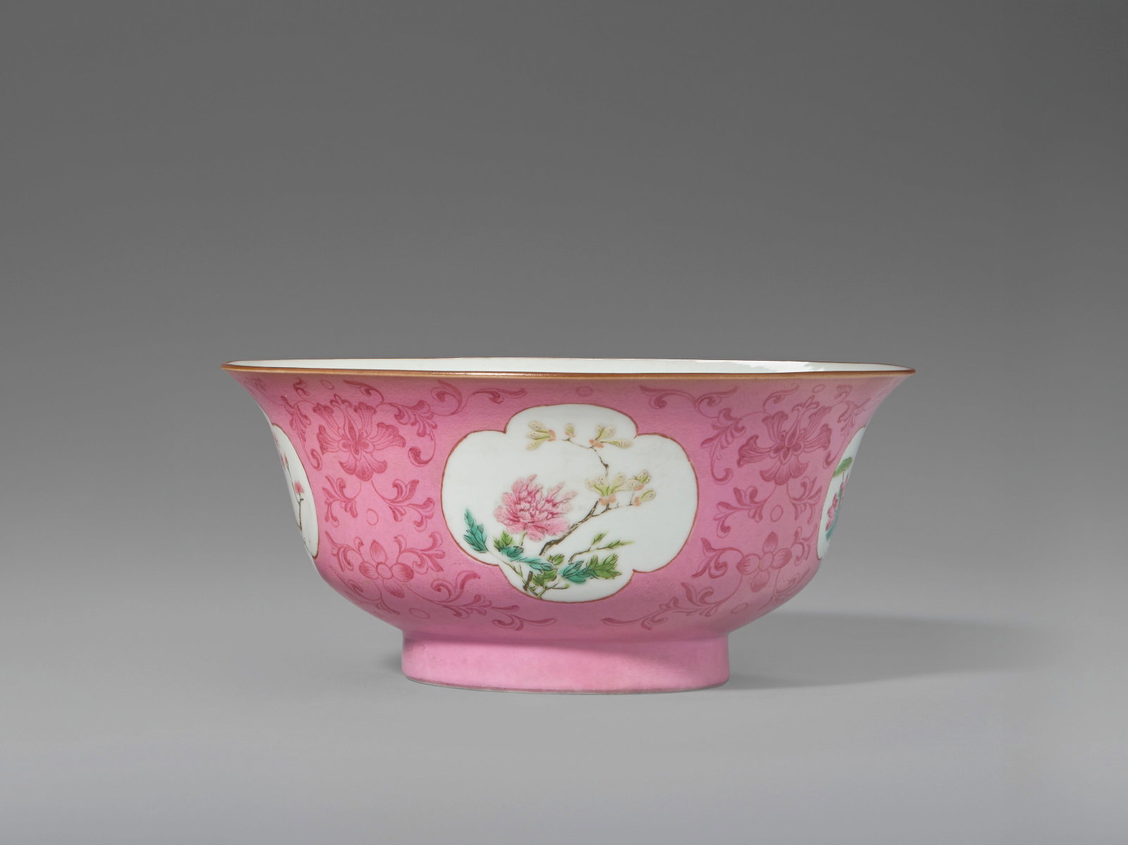 A FAMILLE ROSE PINK-GROUND 'FLORAL MEDALLION' BOWL CHINA, 18TH-19TH CENTURY: Details The base is inscribed with a Qianlong seal mark. Together with a famille rose pink-ground 'landscape medallion' bowl, with an apocryphal Qianlong seal mark on the base, late 19th-early 20th ce