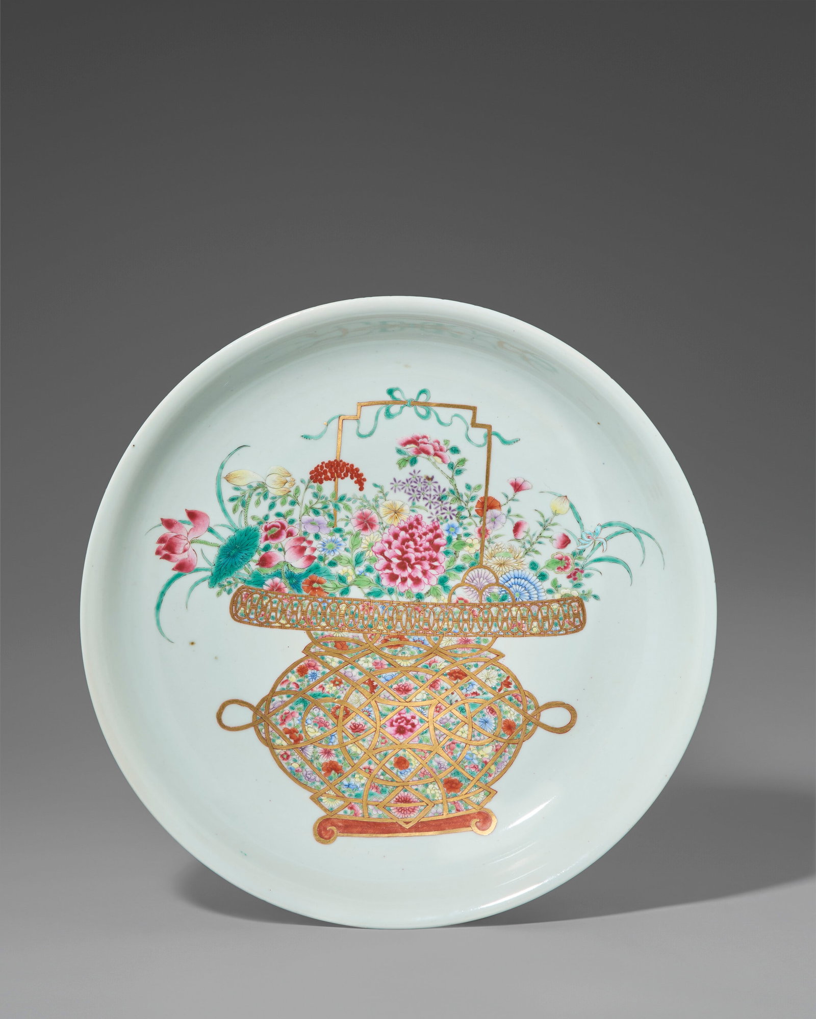 A LARGE FAMILLE ROSE 'FLOWER BASKET' DISH CHINA, REPUBLIC PERIOD (1 of 2)