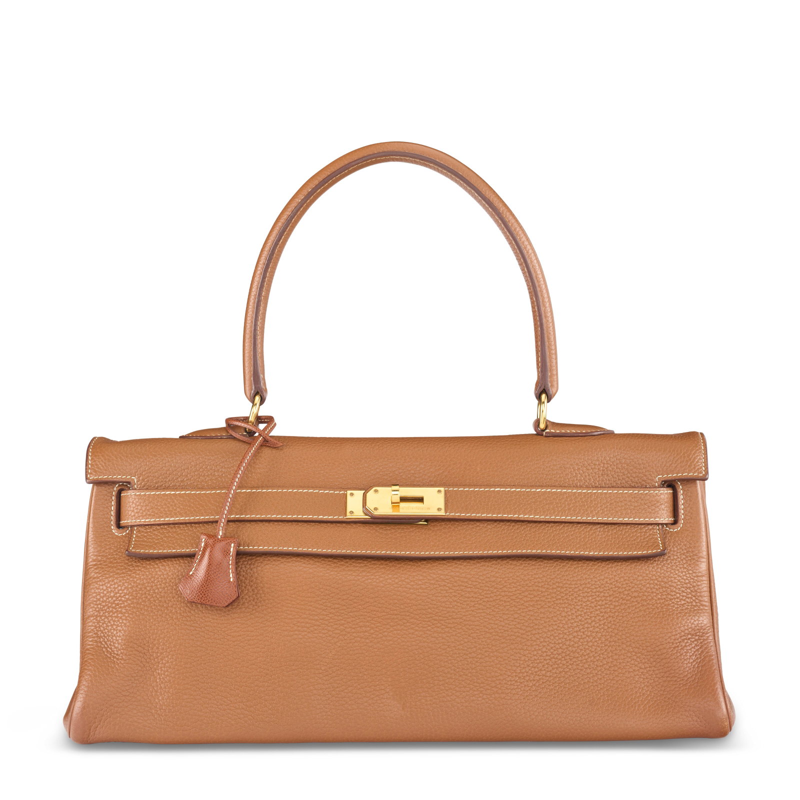 A GOLD CLÉMENCE LEATHER JPG SHOULDER KELLY 42 WITH GOLD HARDWARE HERMÈS, 2009: Details GRADE: 2.5 42 w x 23 h x 18 d cm Includes non-matching Noisette Veau Graine Lisse clochette, two keys and Christie's Dustbag.
