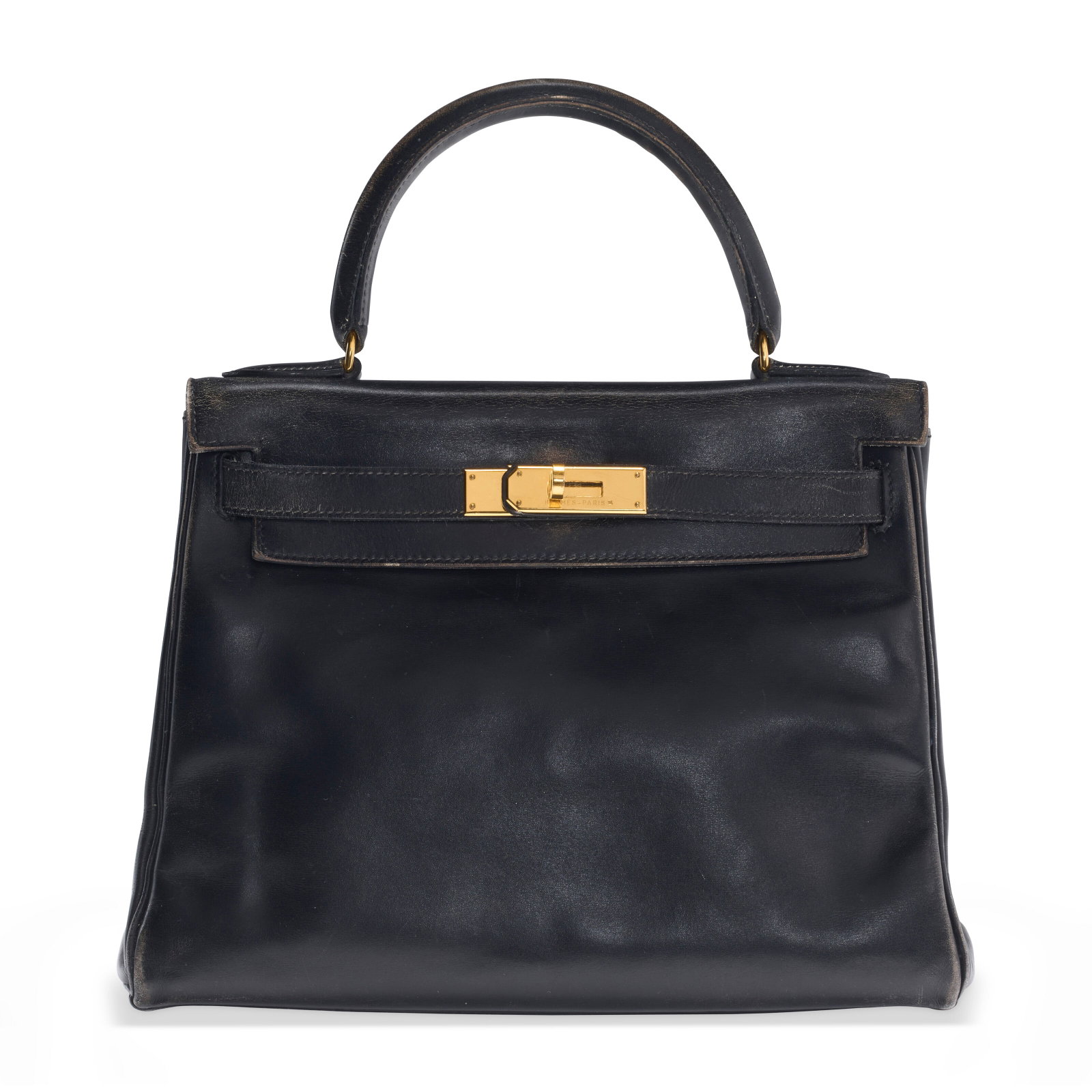 A BLACK CALF BOX LEATHER RETOURNÉ KELLY 28 WITH GOLD HARDWARE HERMÈS, 1996: Details GRADE: 3 28 w x 22 h x 12 d cm Includes Christie's dust bag.
